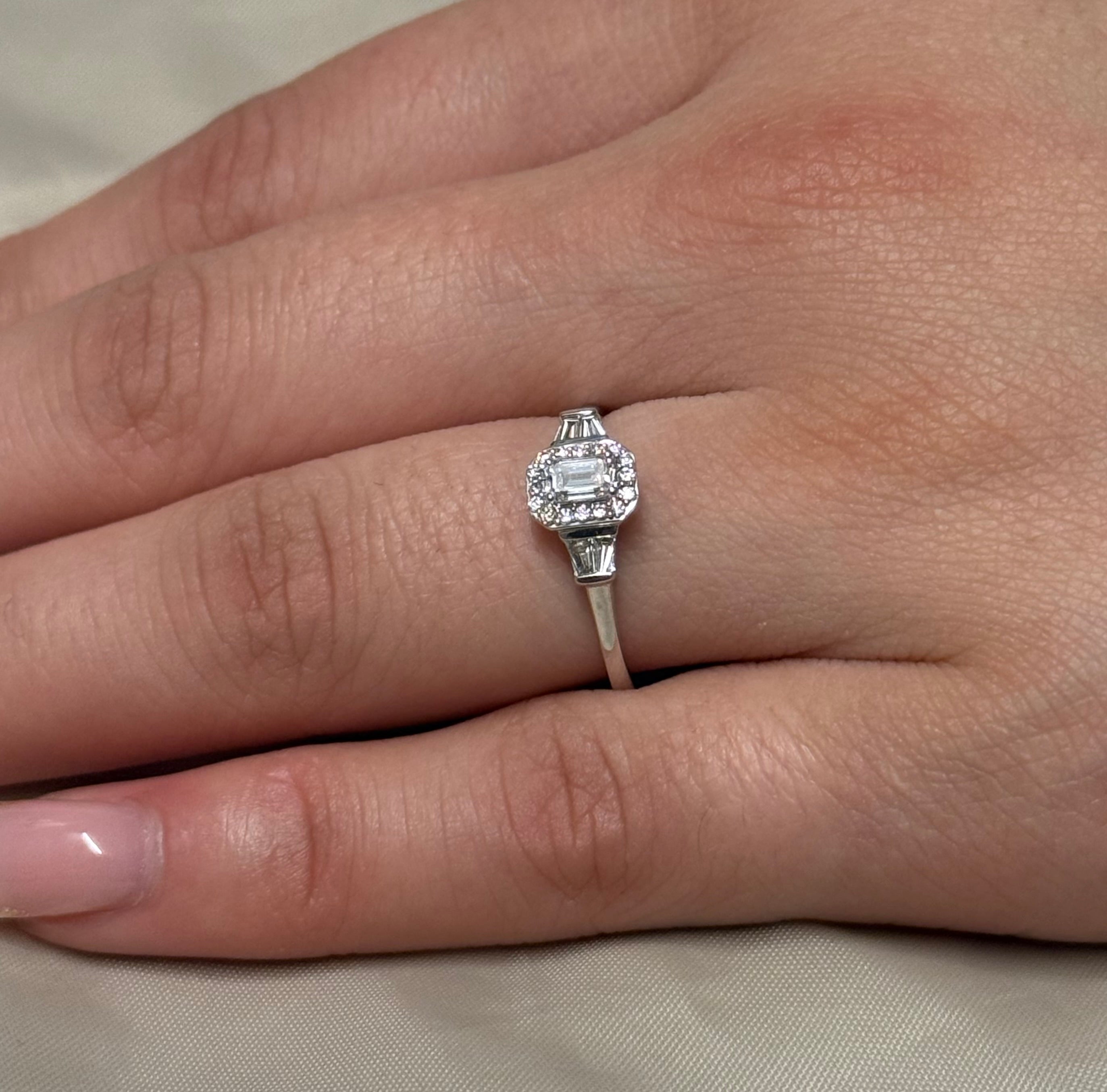 9K White Gold Emerald Cut and Baguette Diamond Cluster with Halo
