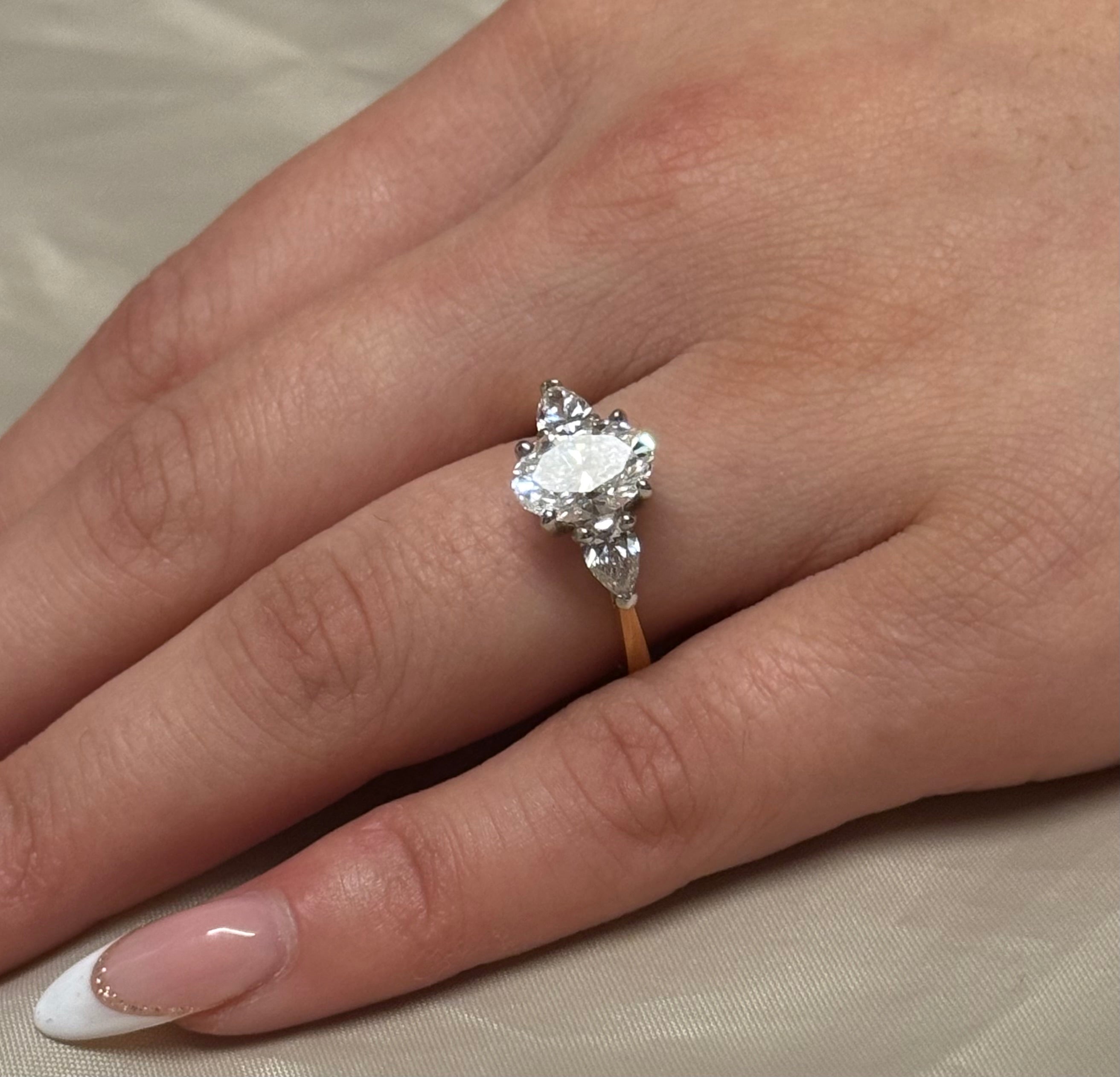 18K Yellow Gold 2.71ct Oval and Pear Three Stone Laboratory Grown Diamond Ring