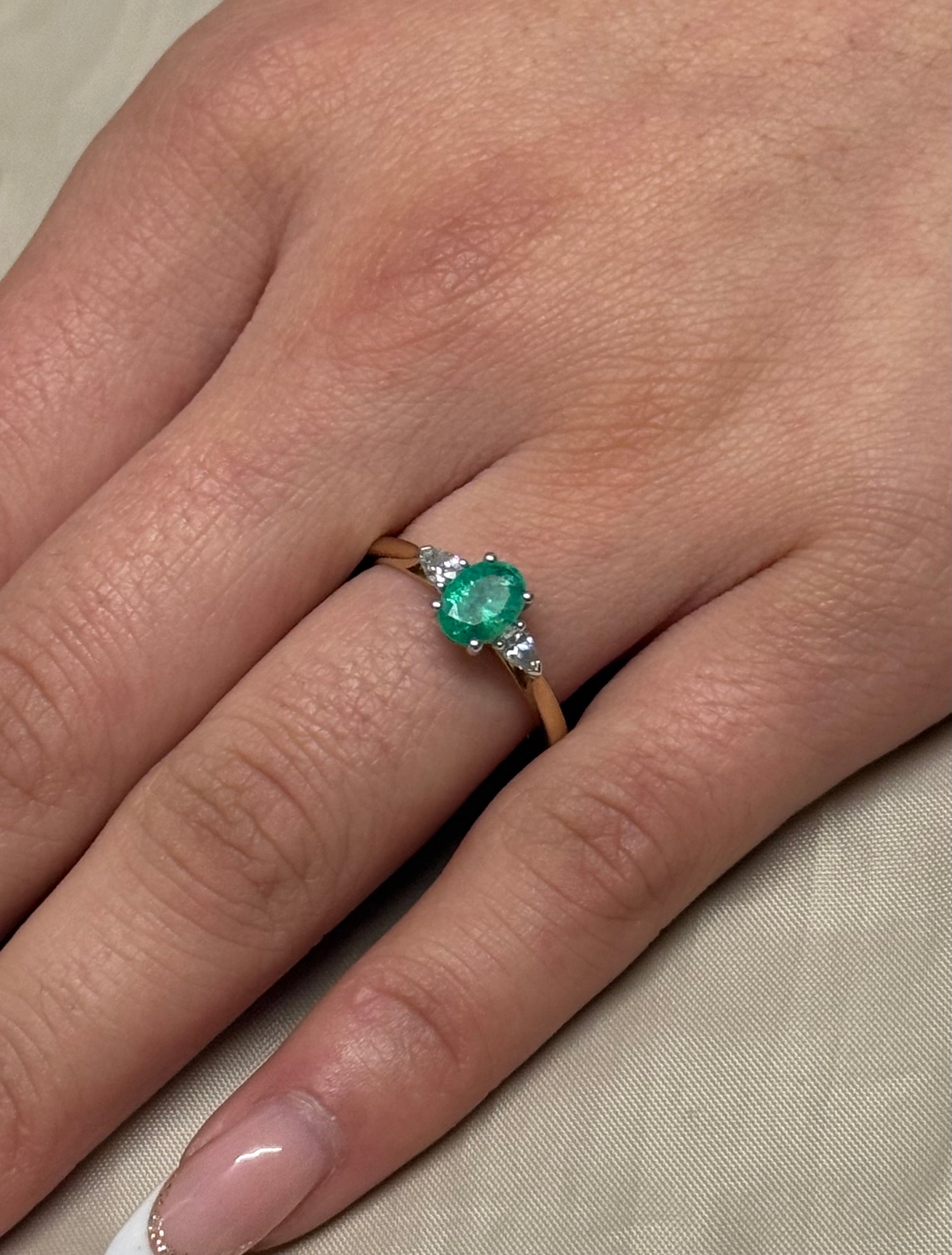 9K Yellow Gold Oval Emerald with Pear Diamond Side Stones