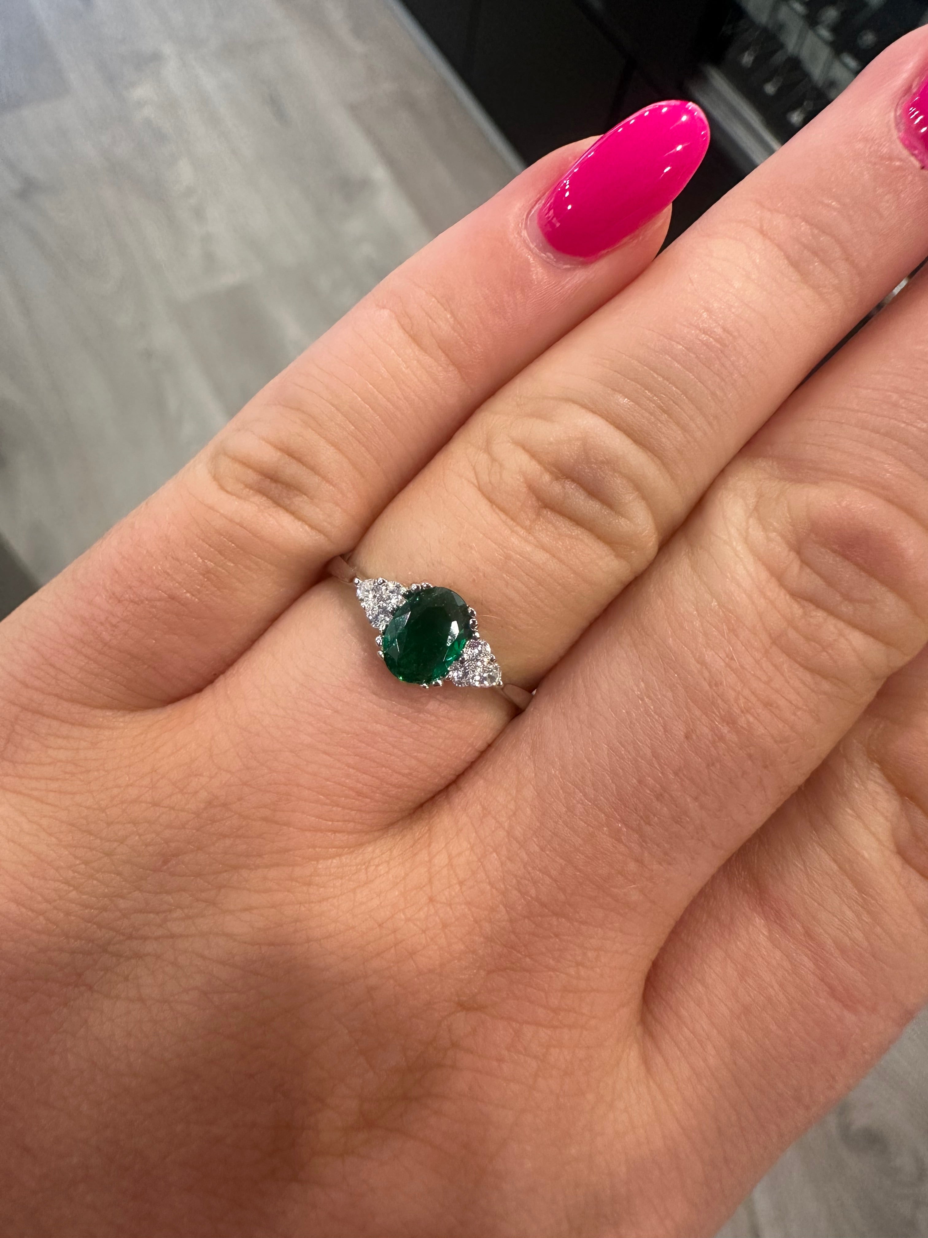 Sterling Silver Oval Green Stone Ring with CZ Clustered Side Stones