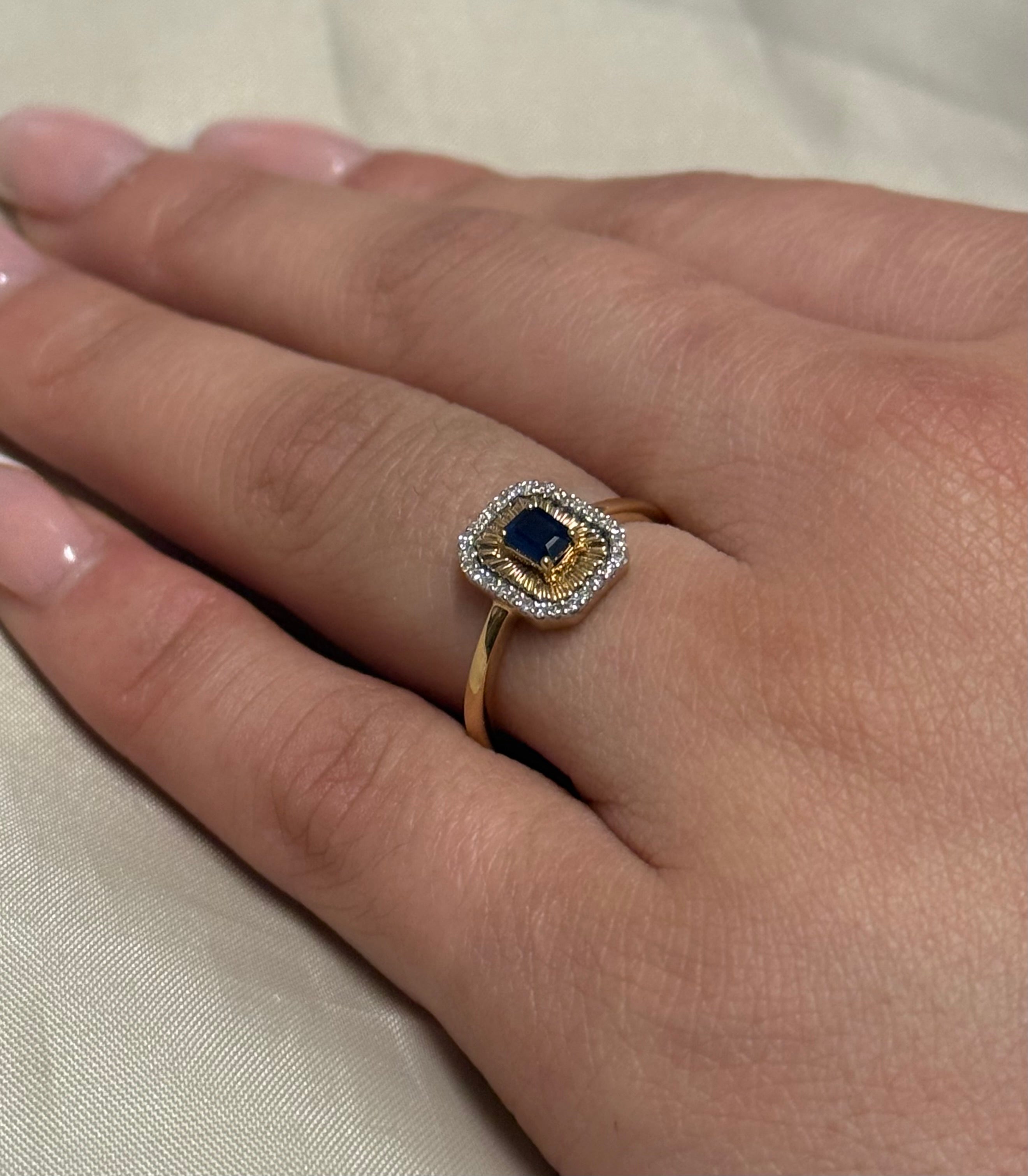 9K Yellow Gold Emerald Cut Sapphire with Diamond Halo