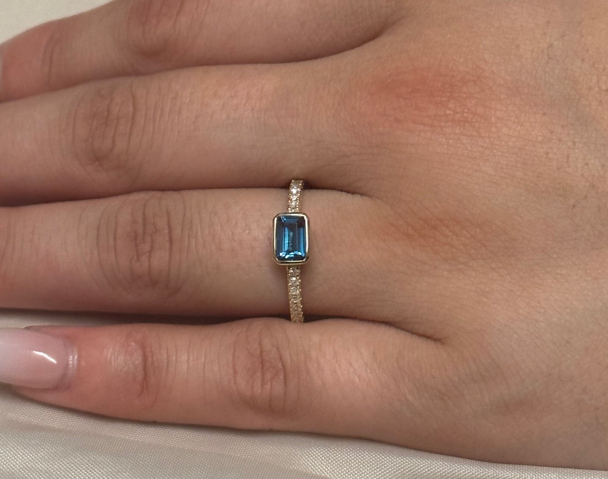 9K Yellow Gold East West Emerald Cut London Blue Topaz Ring With Diamond Band