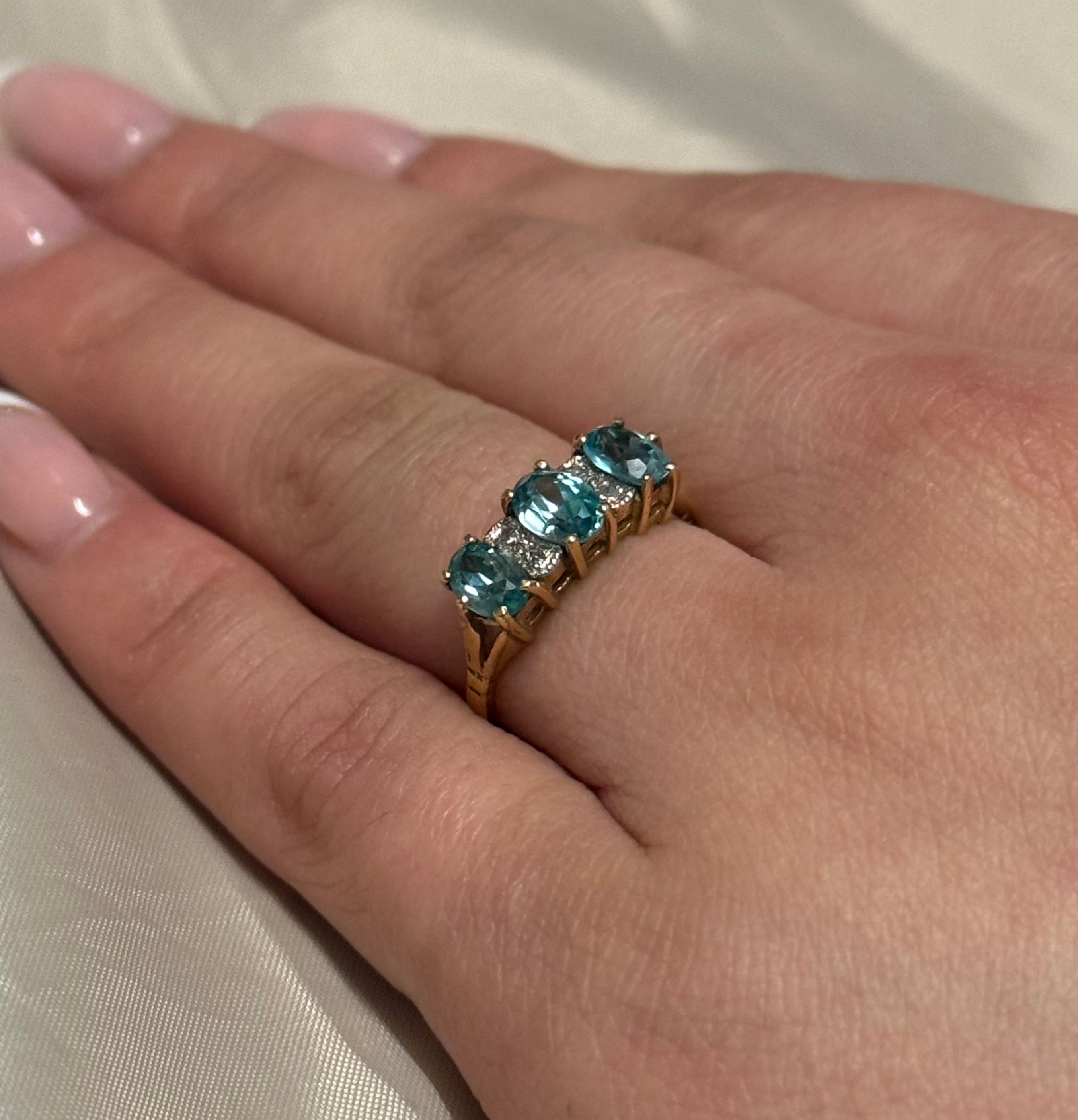 9K Yellow Gold Blue Topaz and Diamond Three Stone