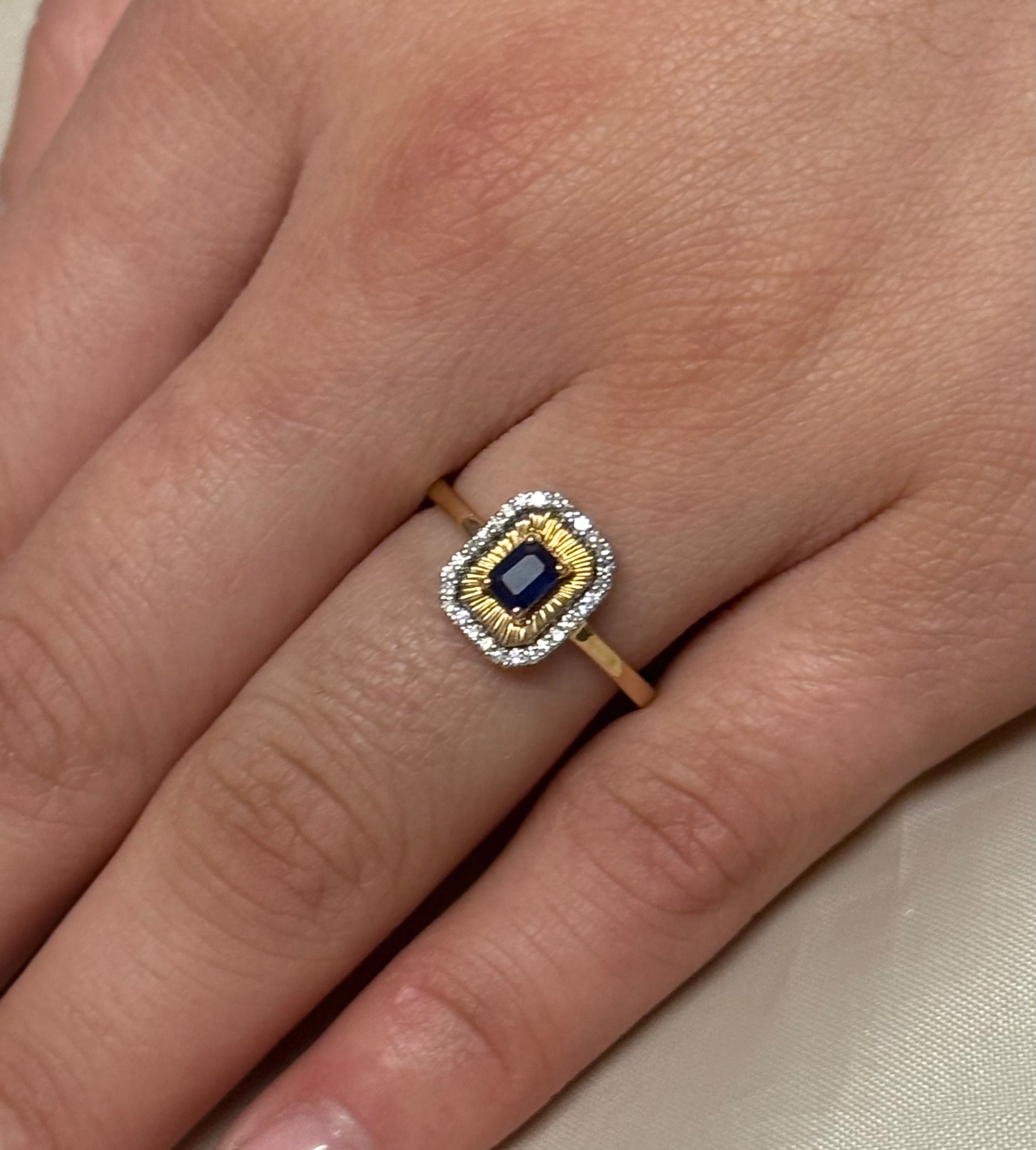 9K Yellow Gold Emerald Cut Sapphire with Diamond Halo