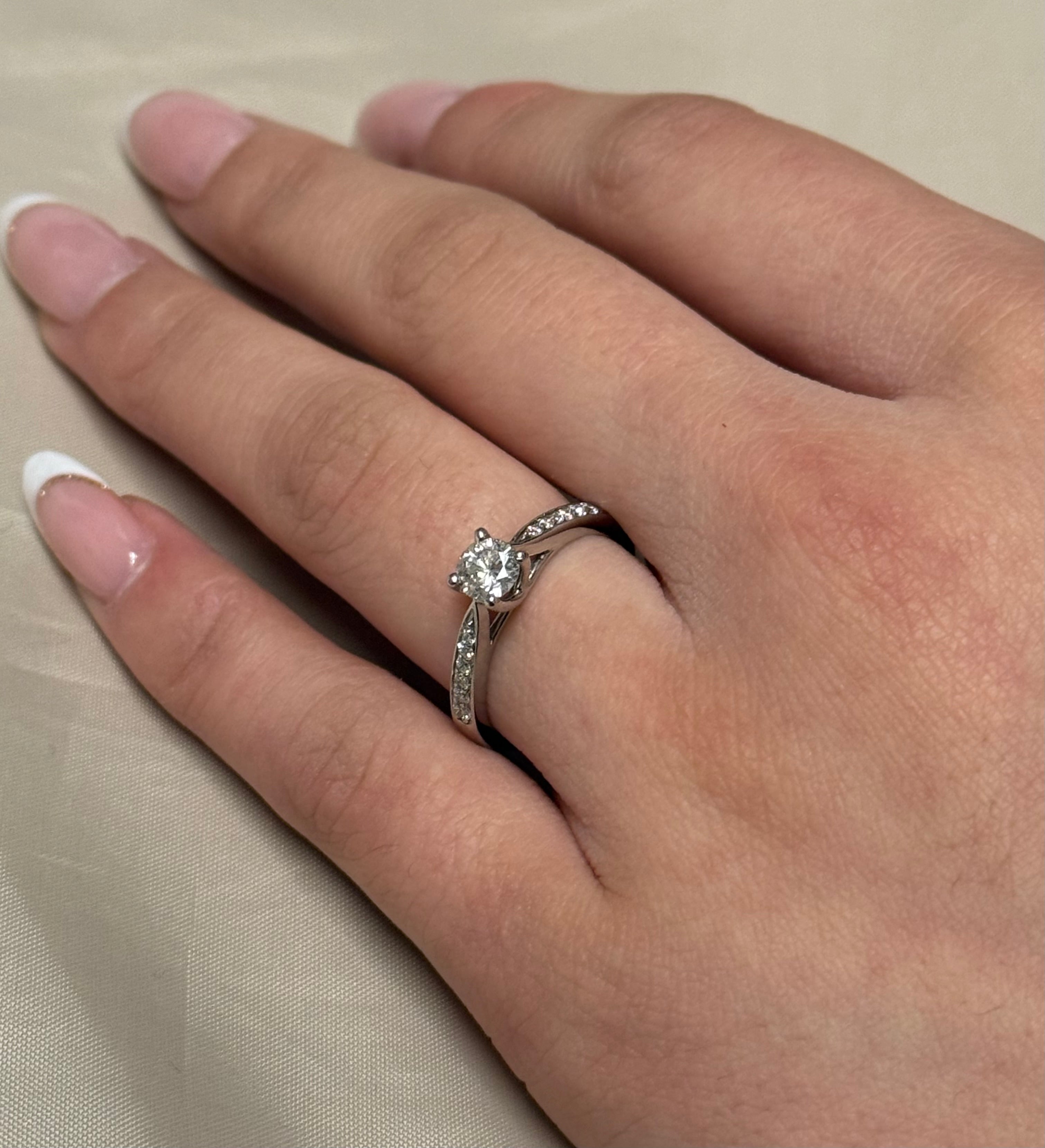 Platinum Brilliant Cut Diamond Solitaire With Diamond Band