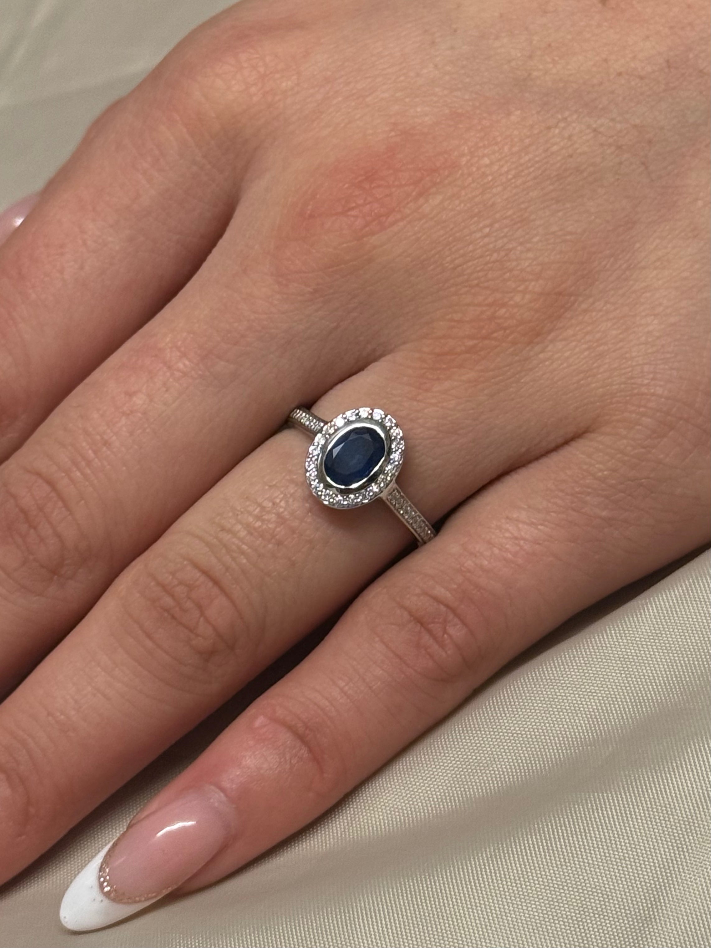 9ct White Gold Oval Sapphire and Diamond Halo Ring