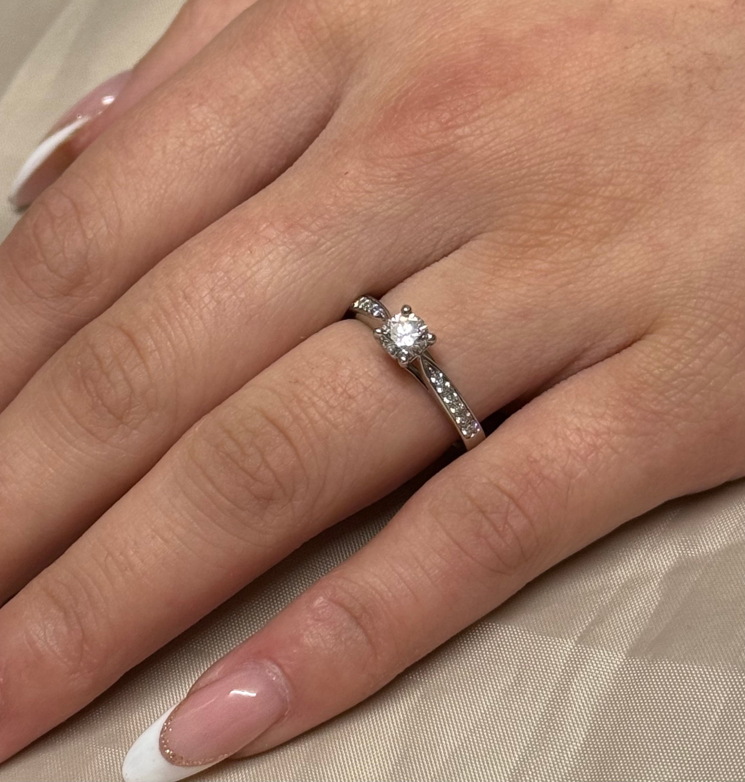 Platinum Brilliant Cut Diamond Solitaire With Diamond Band