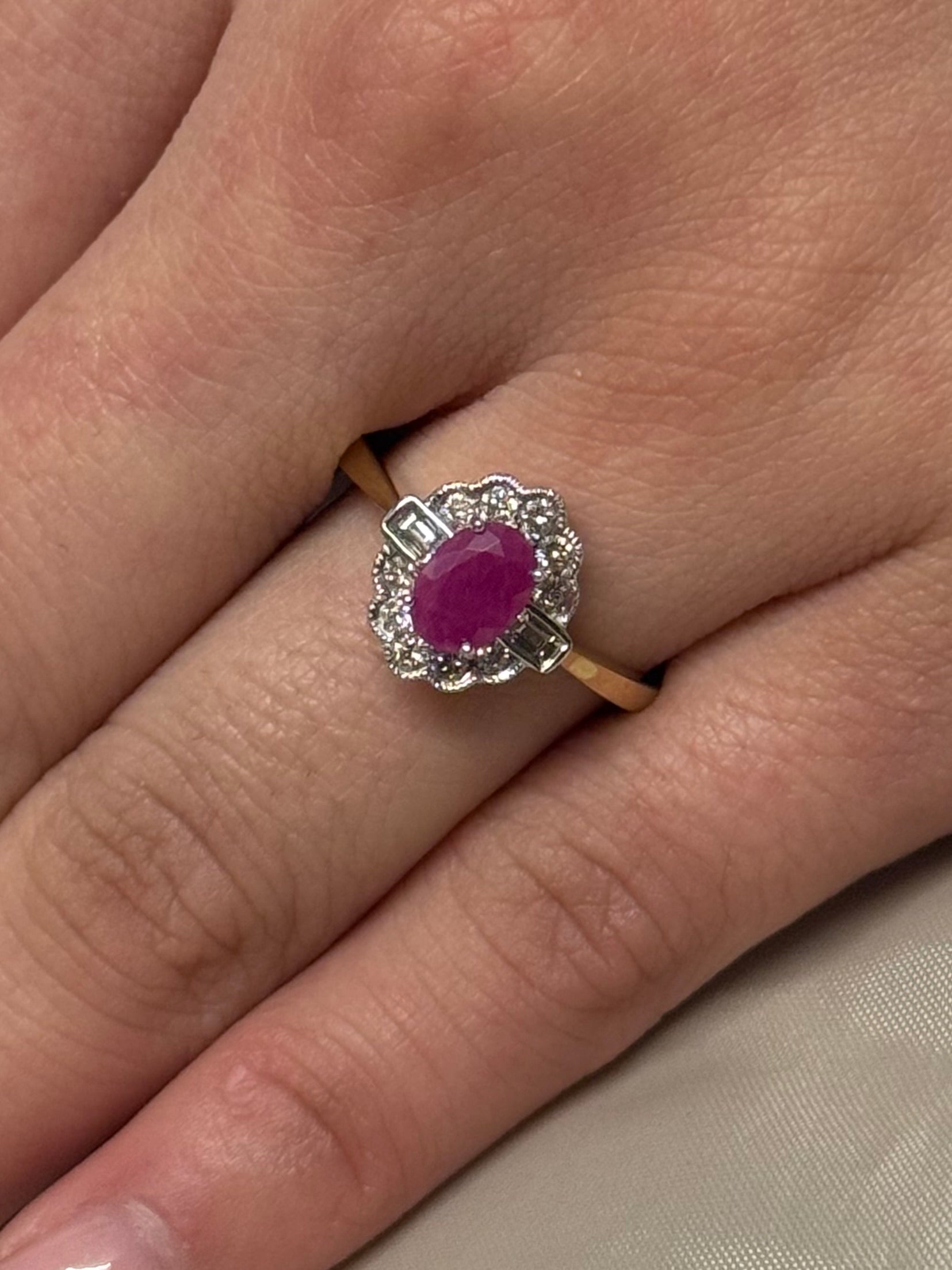 9K Yellow Gold Oval Ruby and Diamond Cluster with Baguette Side Stones