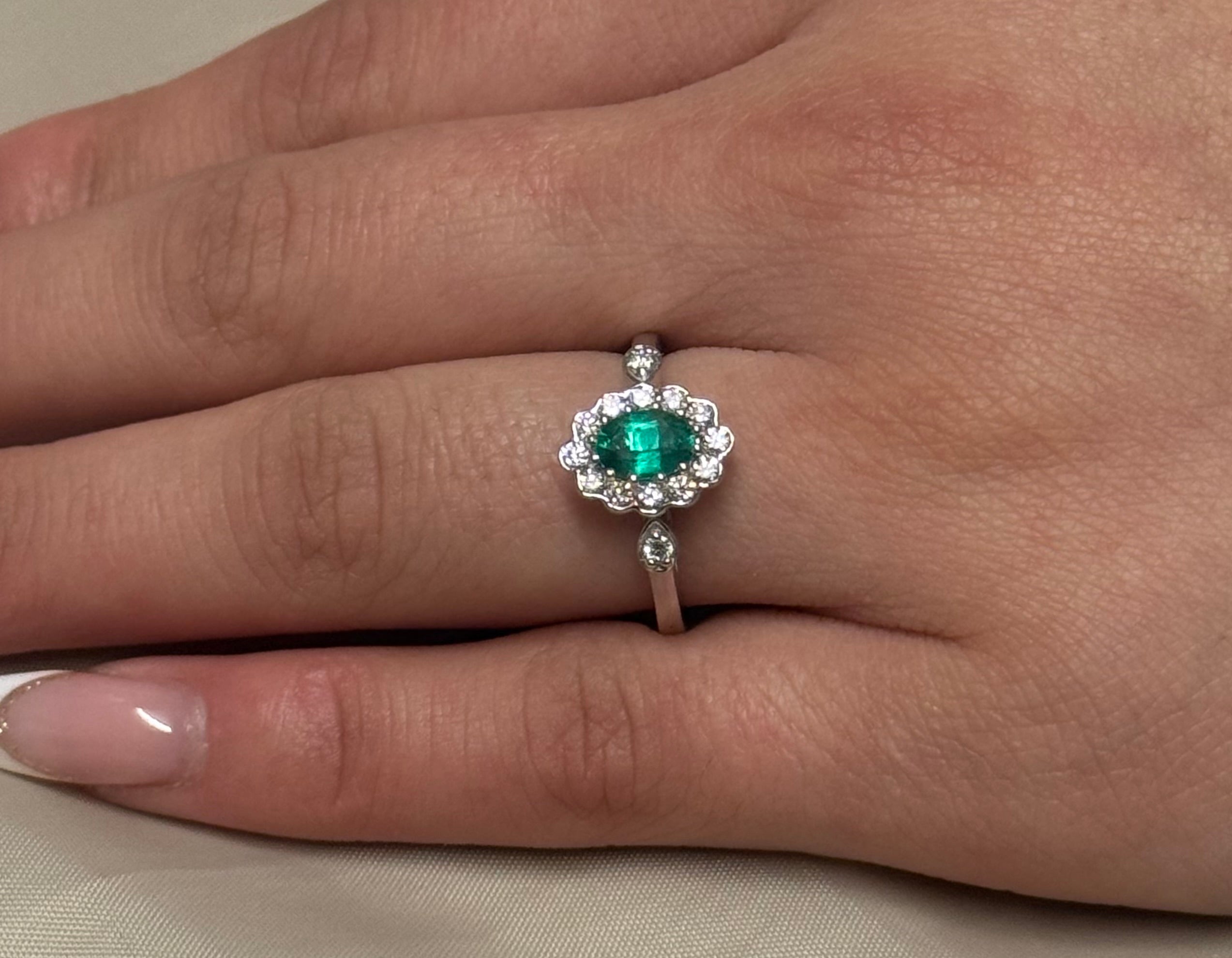 18K White Gold Emerald and Diamond Cluster with Diamond Side Stones