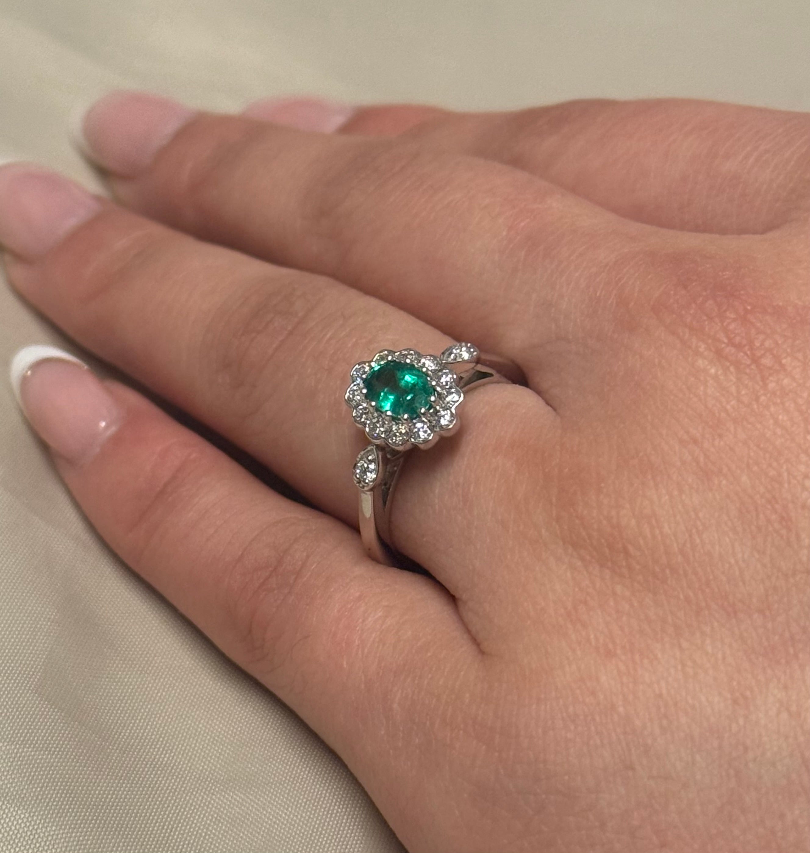 18K White Gold Emerald and Diamond Cluster with Diamond Side Stones