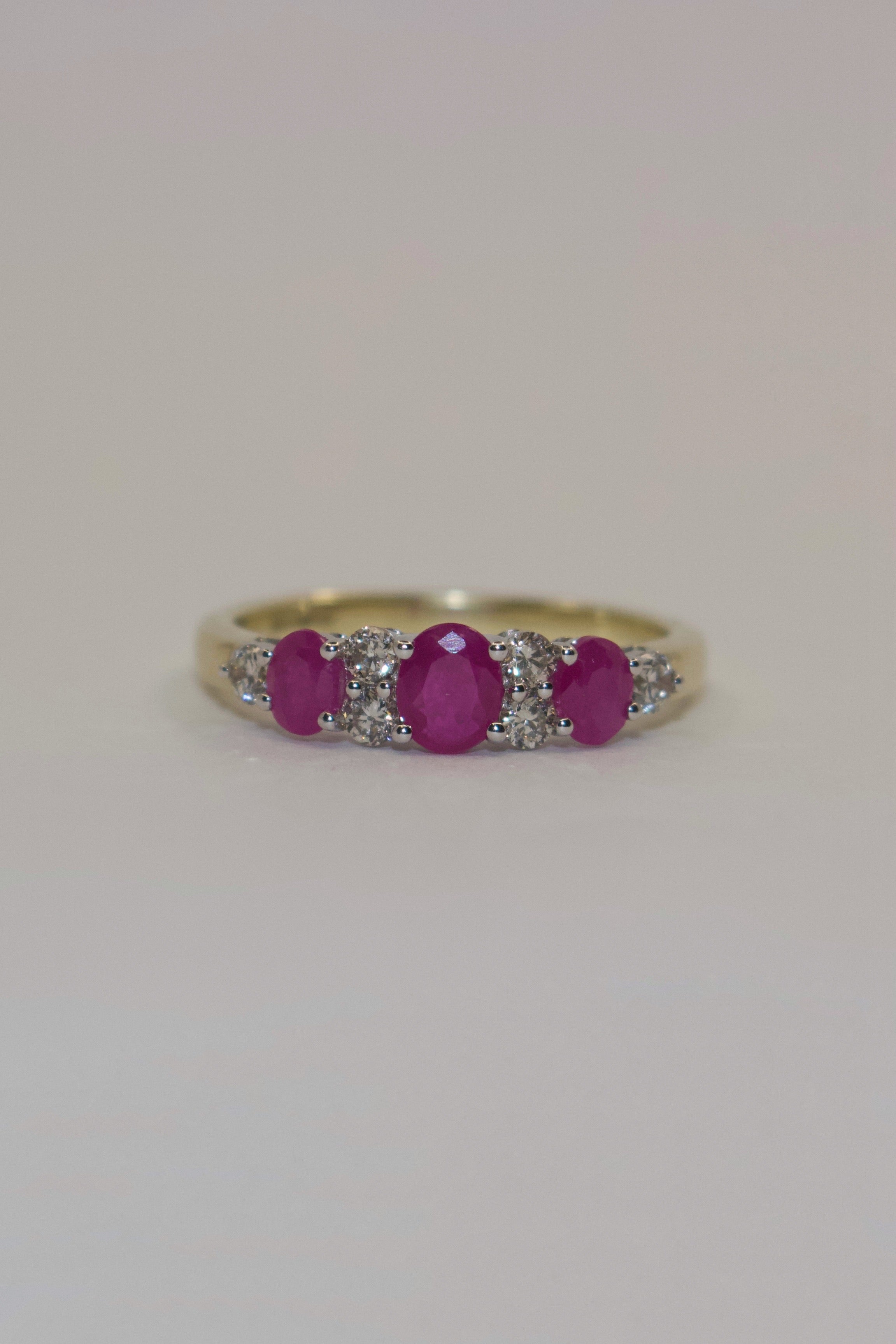 9K Yellow Gold Three Stone Ruby with Diamond Accents