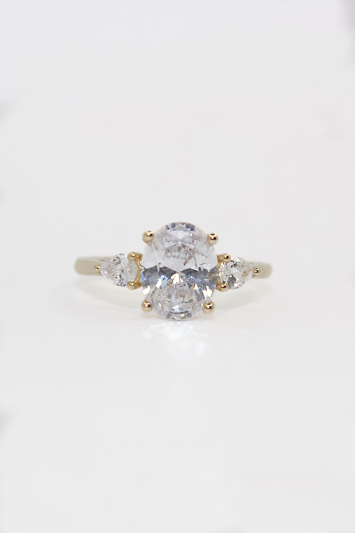 9K Yellow Gold Cz Oval Three Stone with Pear Side Stones