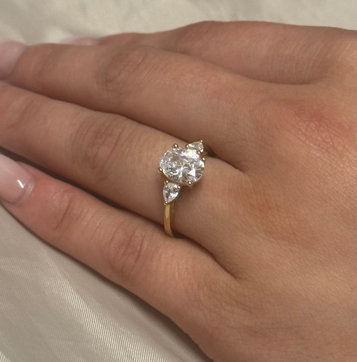 9K Yellow Gold Cz Oval Three Stone with Pear Side Stones