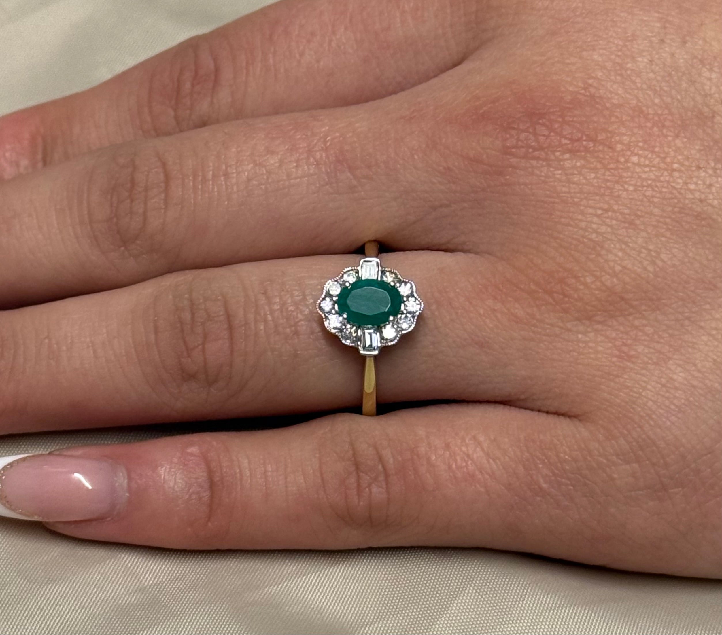 9K Yellow Gold Oval Emerald and Diamond Cluster with Baguette side stones