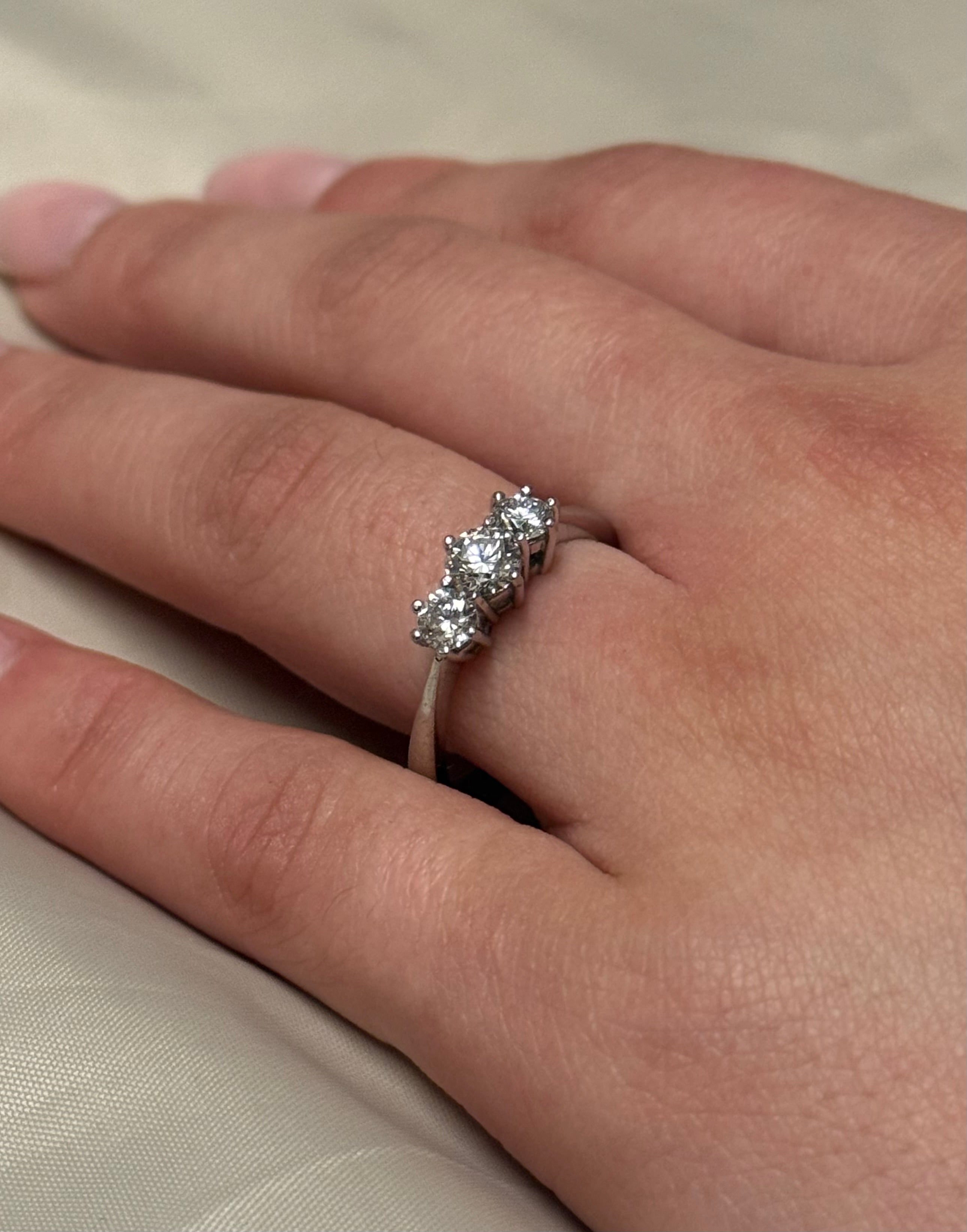 18K White Gold Brilliant Cut Three Stone Diamond Ring
