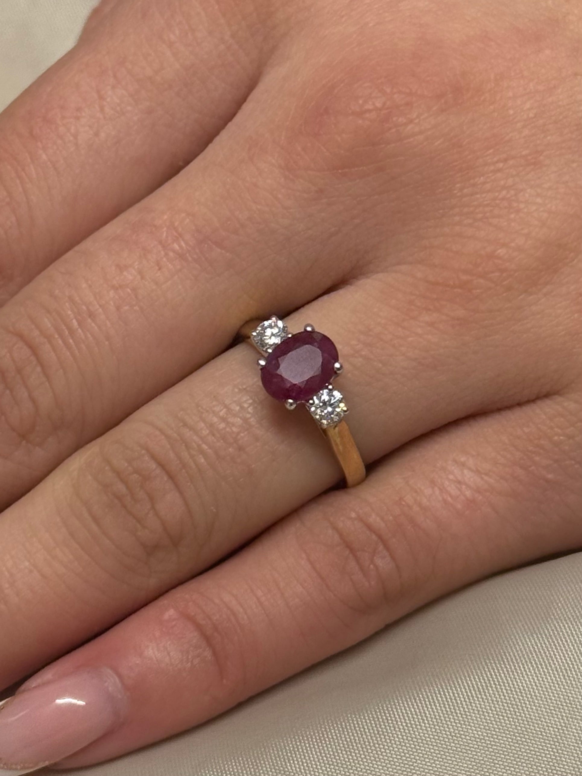 9K Yellow Gold Oval Ruby Ring with Round Diamond Side Stones