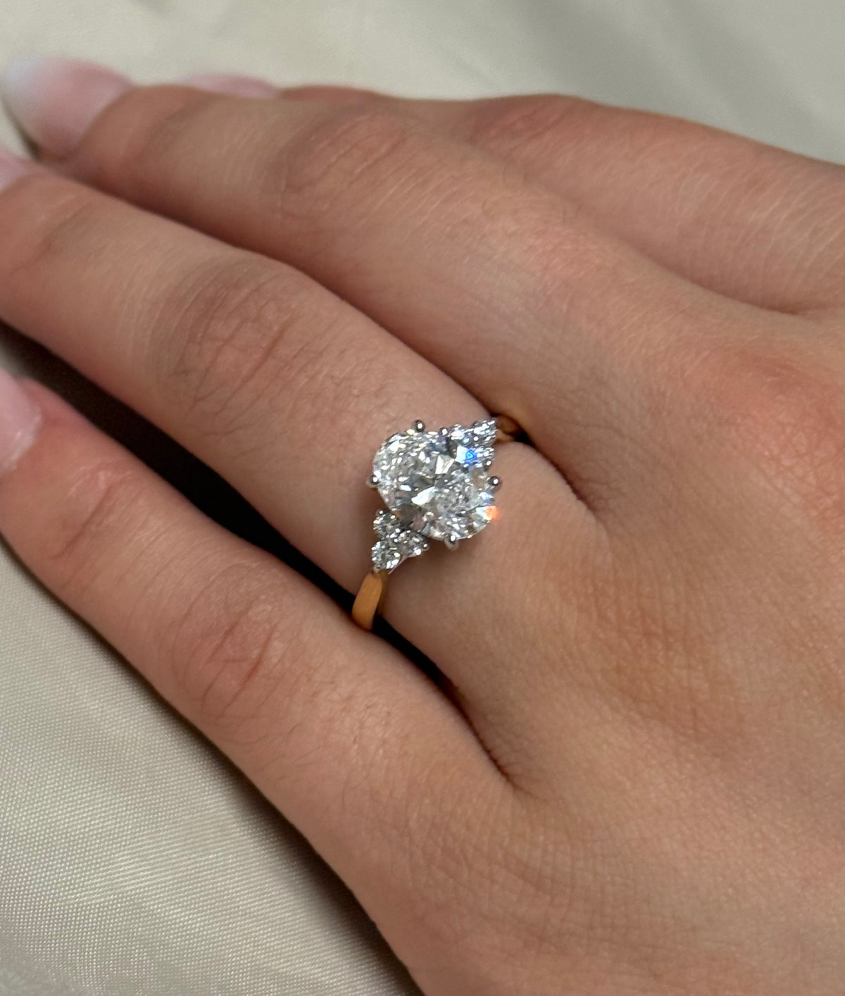 18K Yellow Gold 2.20ct Laboratory Grown Oval Ring with Brilliant Cut Side Stones