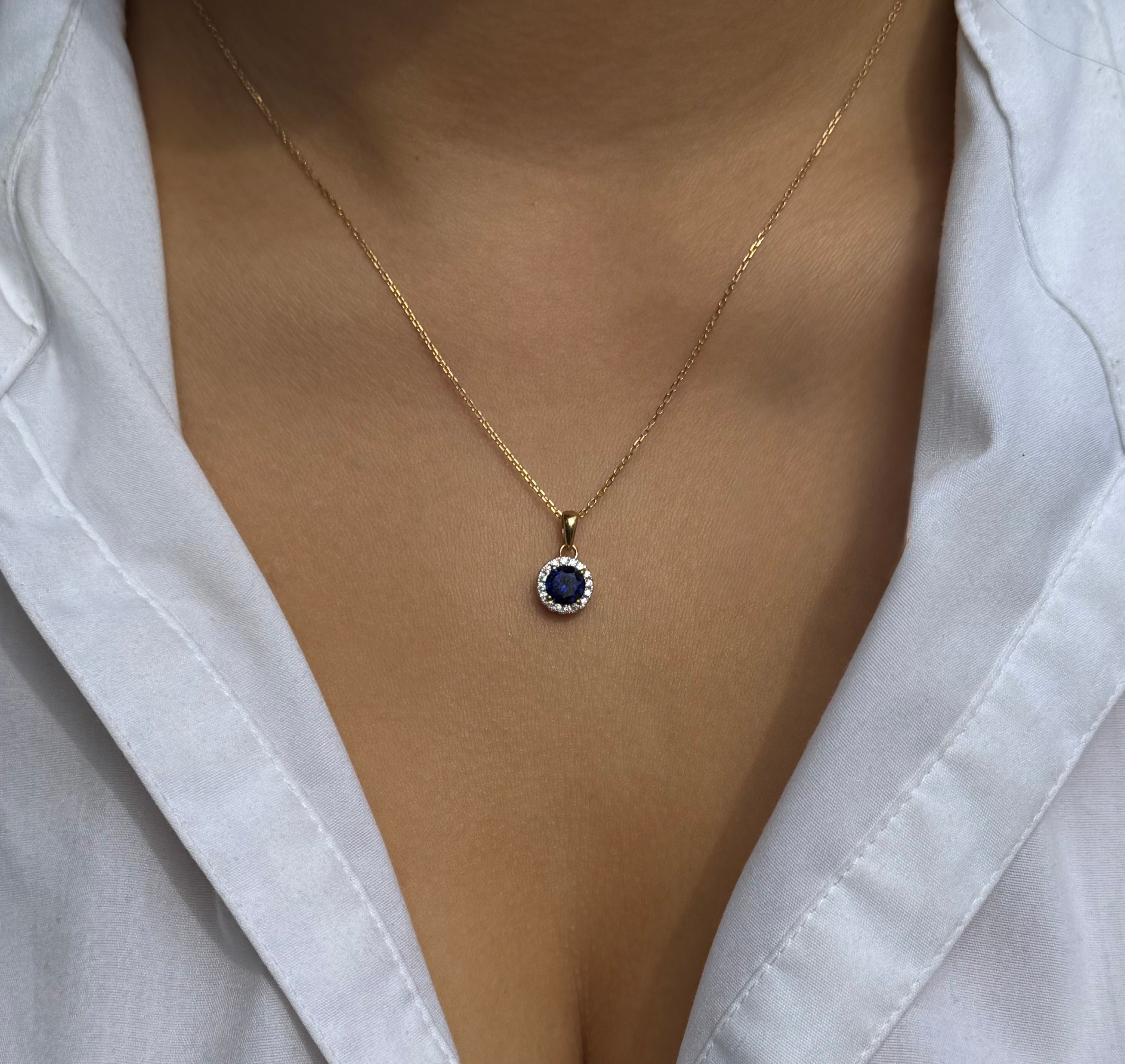 9ct Yellow Gold Round Blue Stone with CZ Halo Pendant