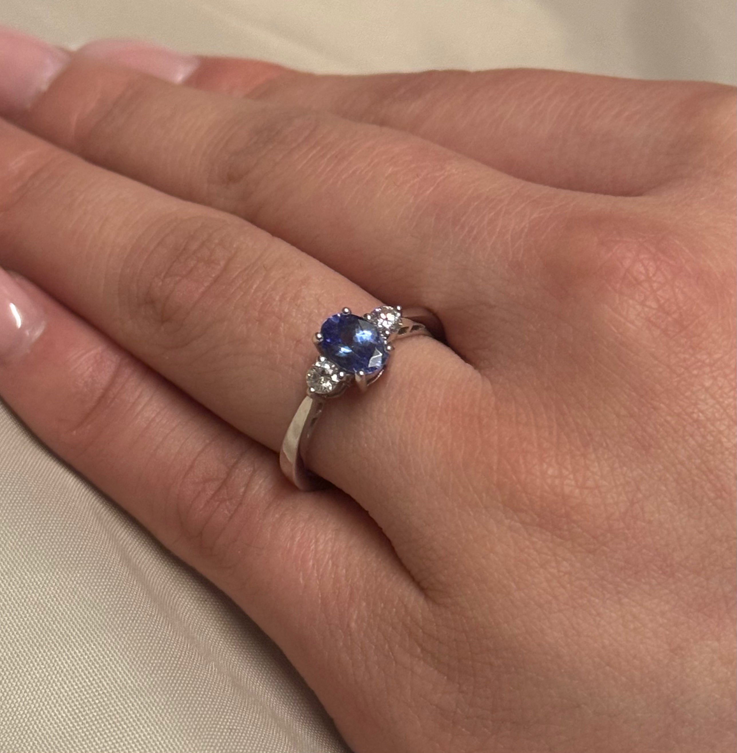 18K White Gold Oval Tanzanite with Round Diamond Side Stones