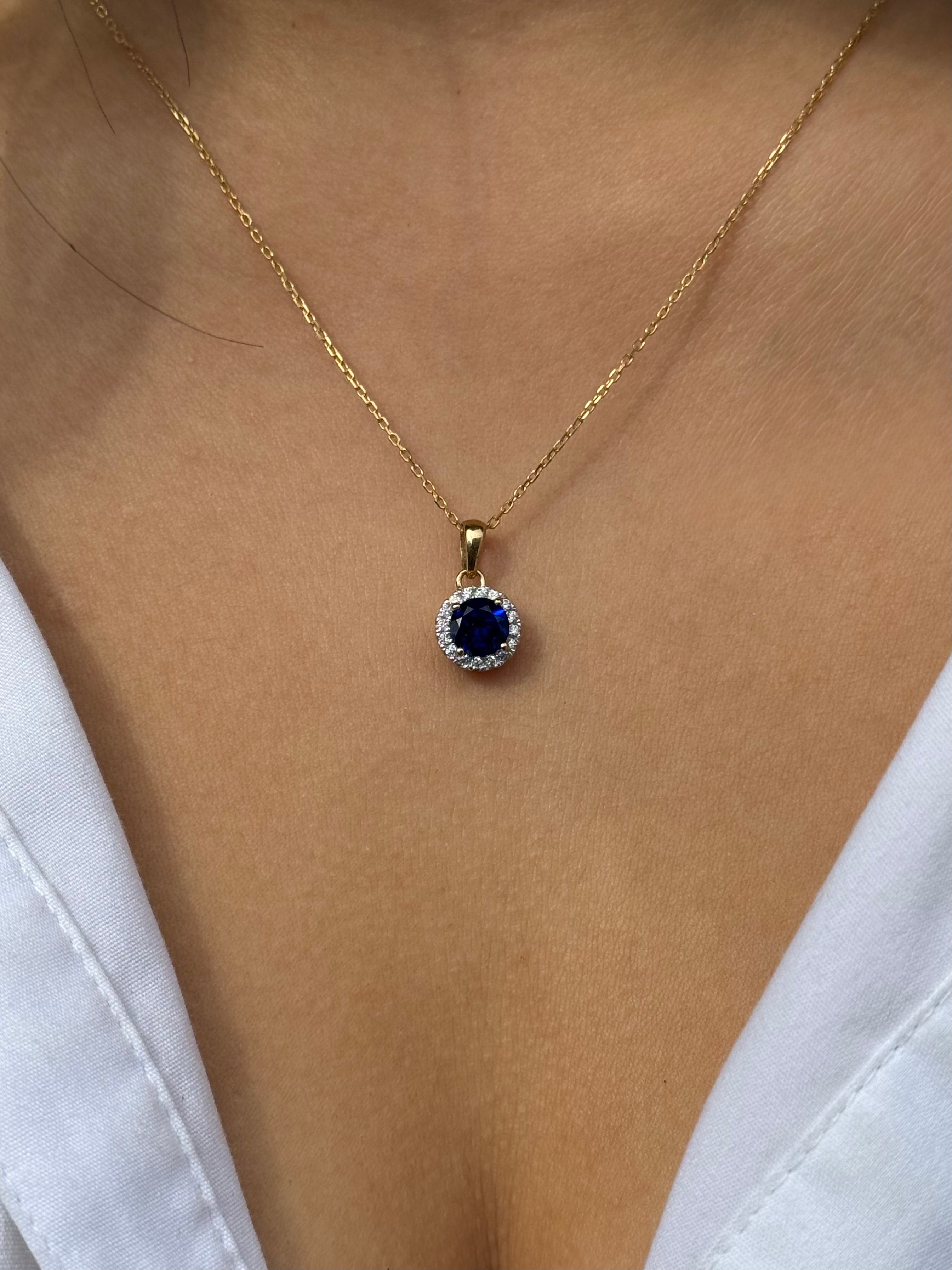 9ct Yellow Gold Round Blue Stone with CZ Halo Pendant