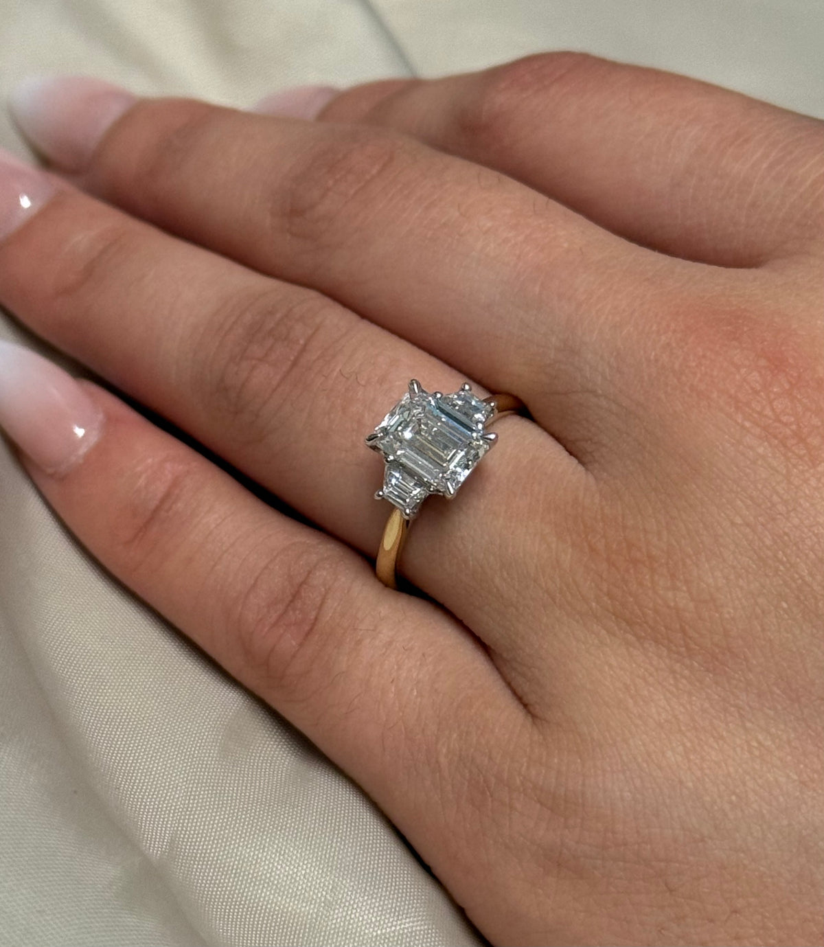 9K Yellow Gold 2.42ct Laboratory Grown Emerald Cut and Trapezoid Three Stone Ring