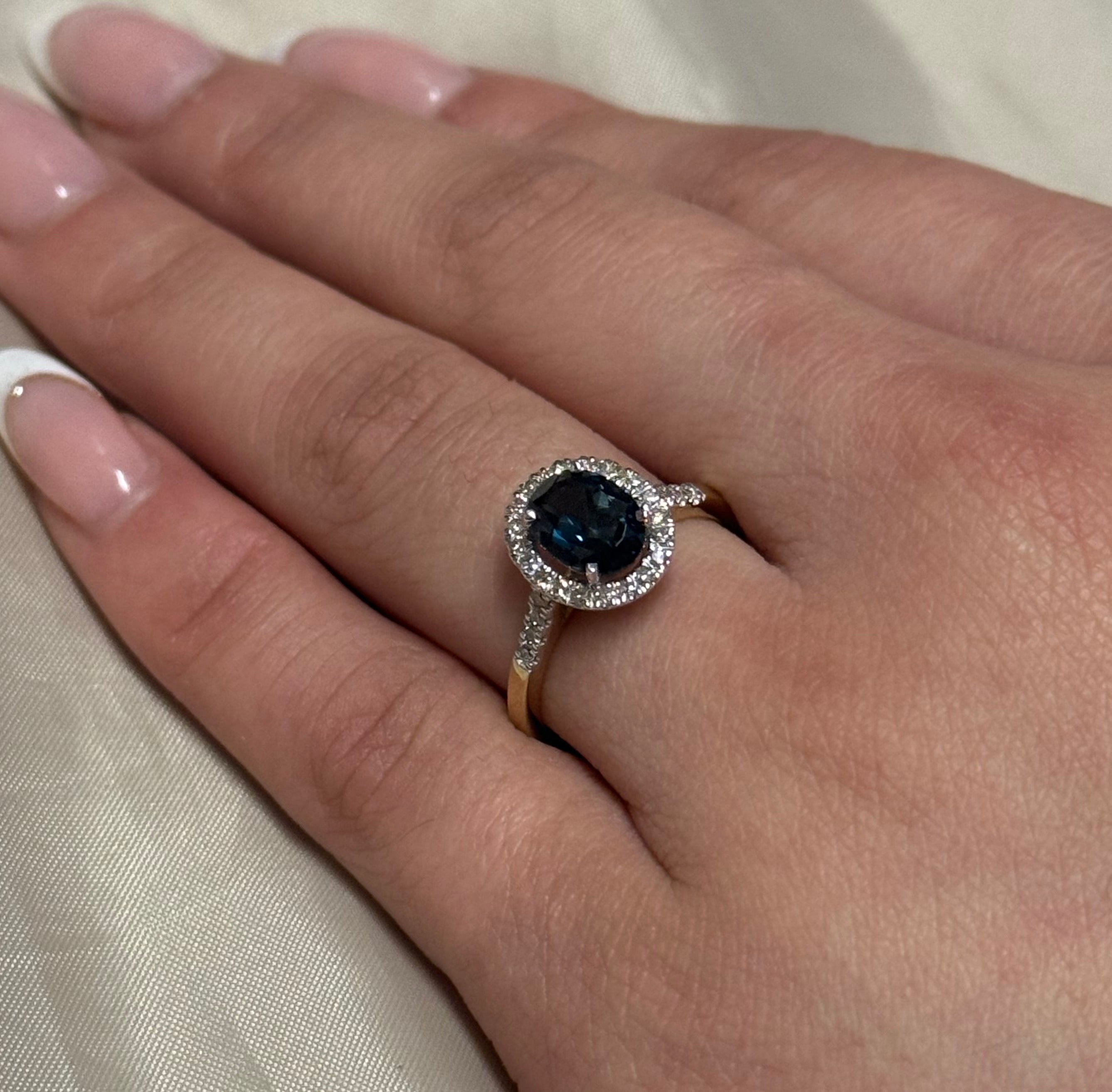9K Yellow Gold Oval London Blue Topaz with Diamond Halo