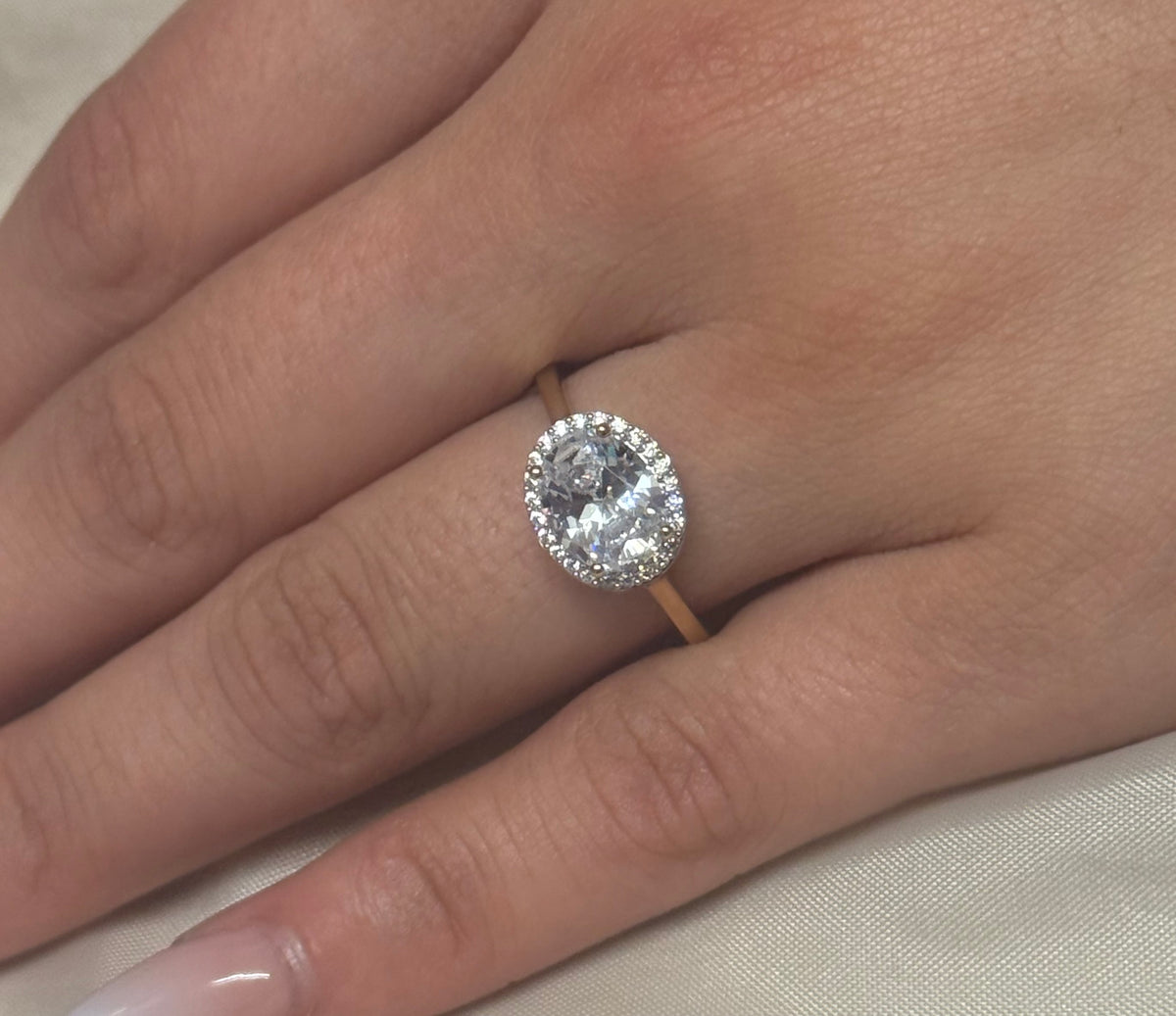 9K Yellow Gold Cz East West Oval Ring with Halo