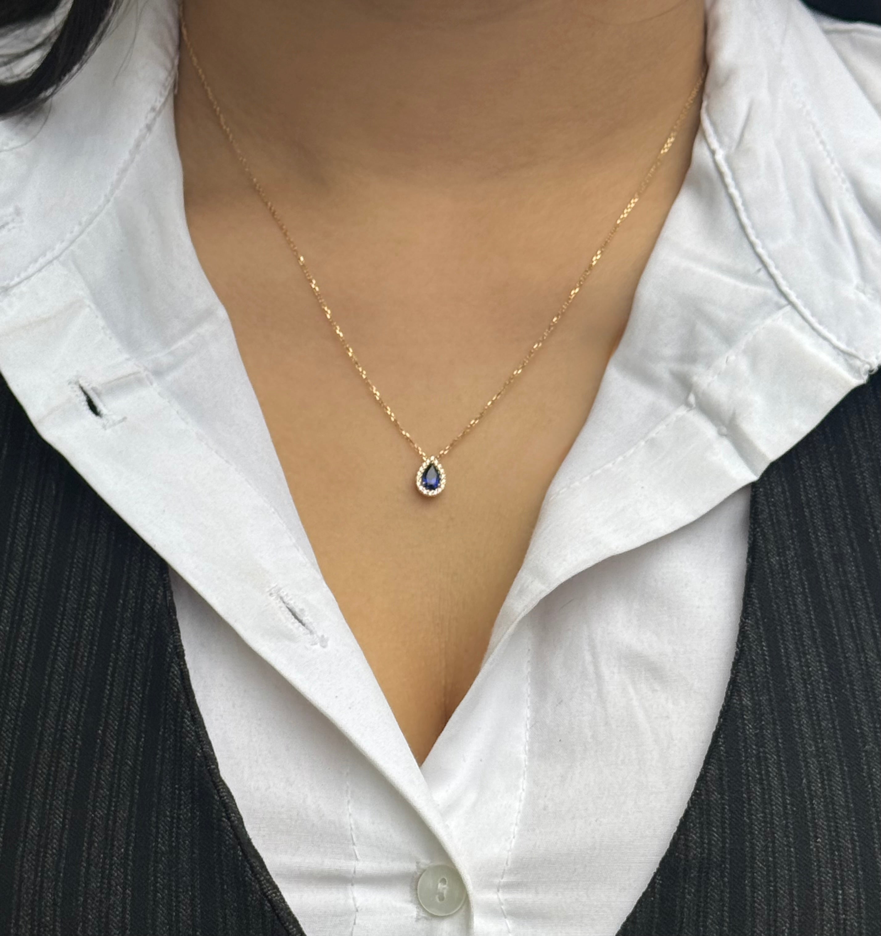 9ct Yellow Gold Small Blue Stone Pear and Cz Halo Pendant