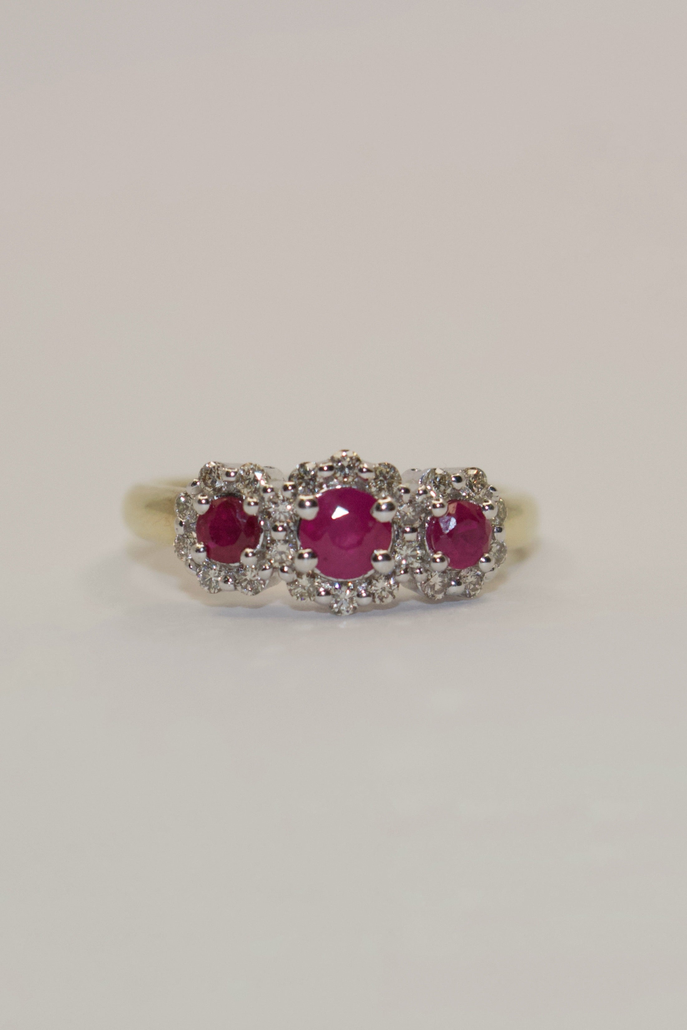 9K Yellow Gold Round Ruby Three Stone with Diamond Halo
