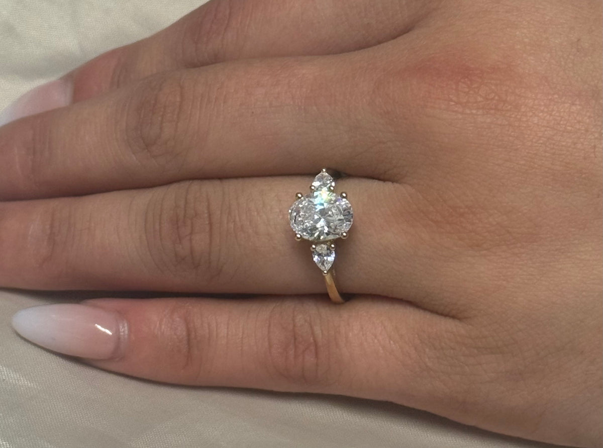 9K Yellow Gold Cz Oval Three Stone with Pear Side Stones