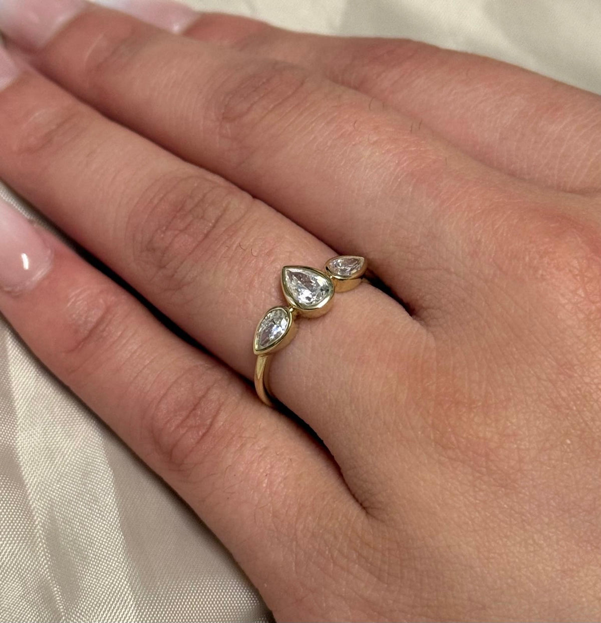 9K Yellow Gold Bezel Set Pear Three Stone CZ Marquise Ring