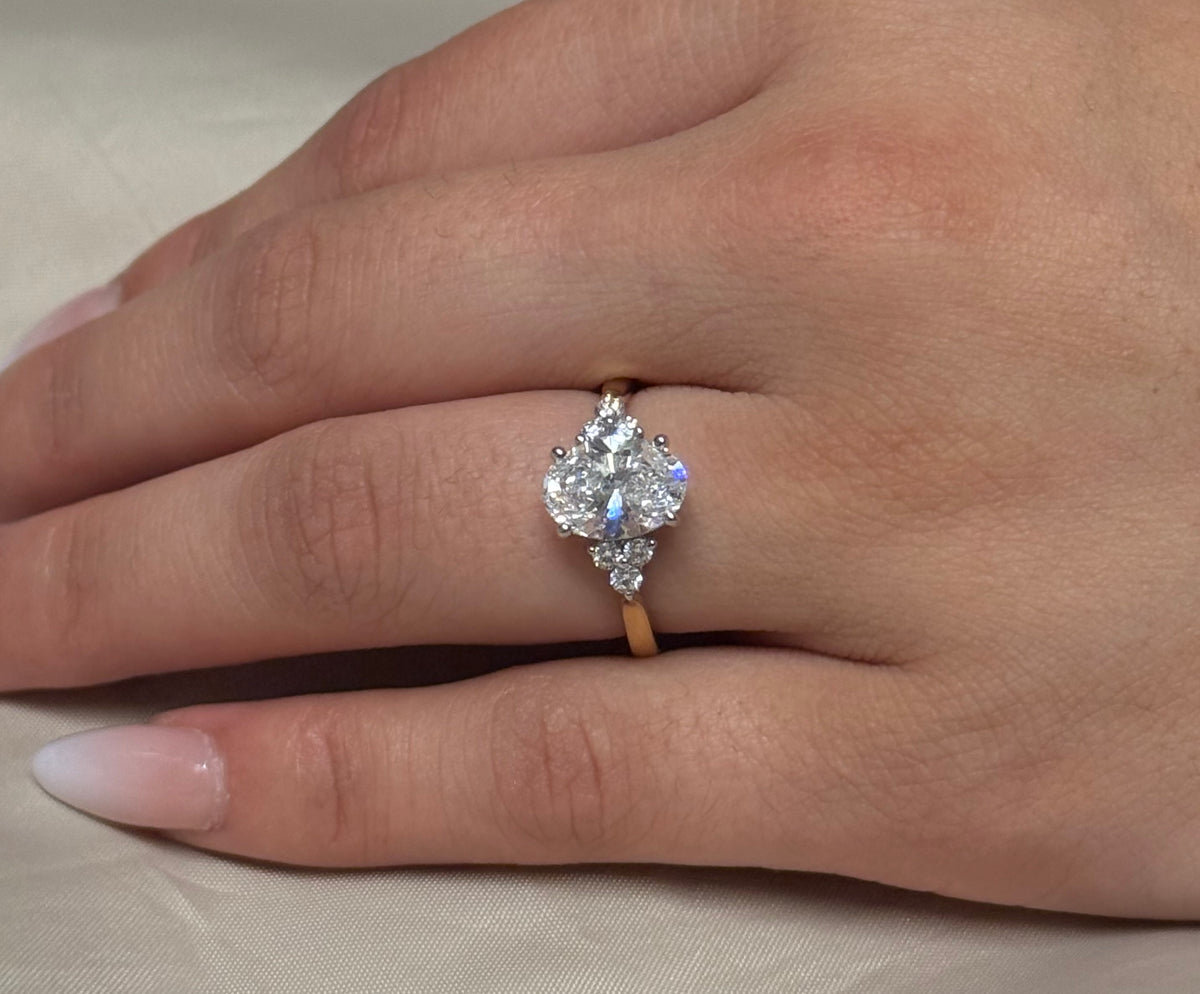 18K Yellow Gold 2.20ct Laboratory Grown Oval Ring with Brilliant Cut Side Stones