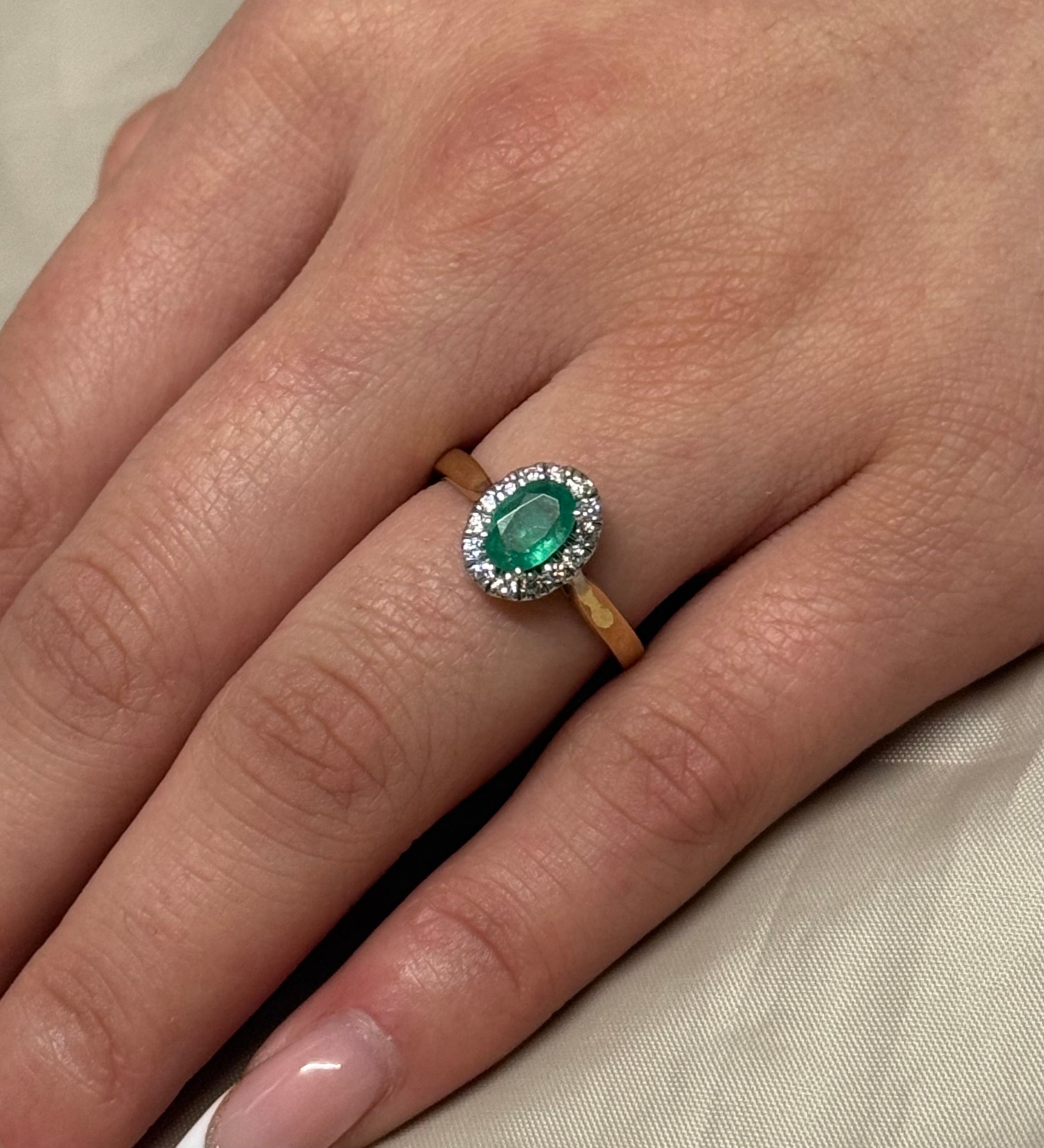 9K Yellow Gold Oval Emerald with Diamond Halo