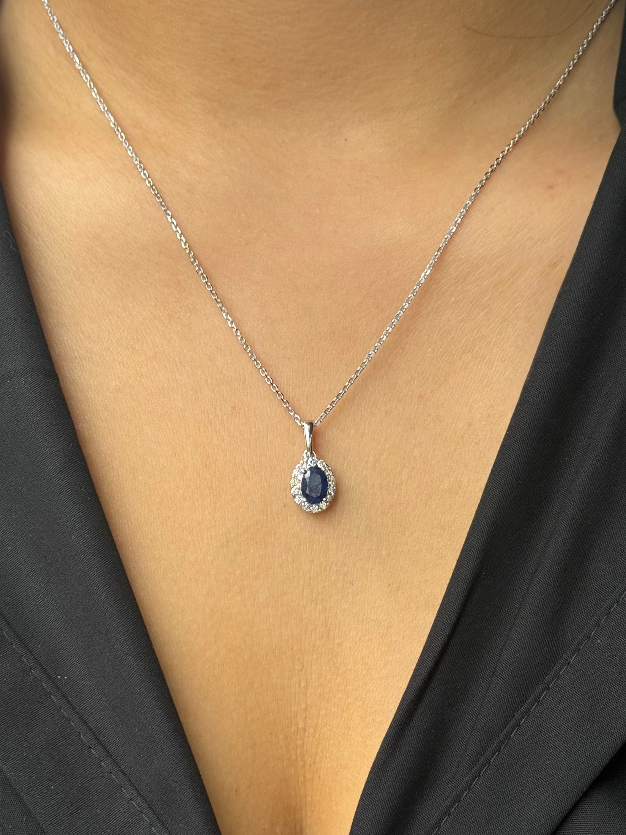 9ct White Gold Sapphire & Diamond Oval Halo Pendant