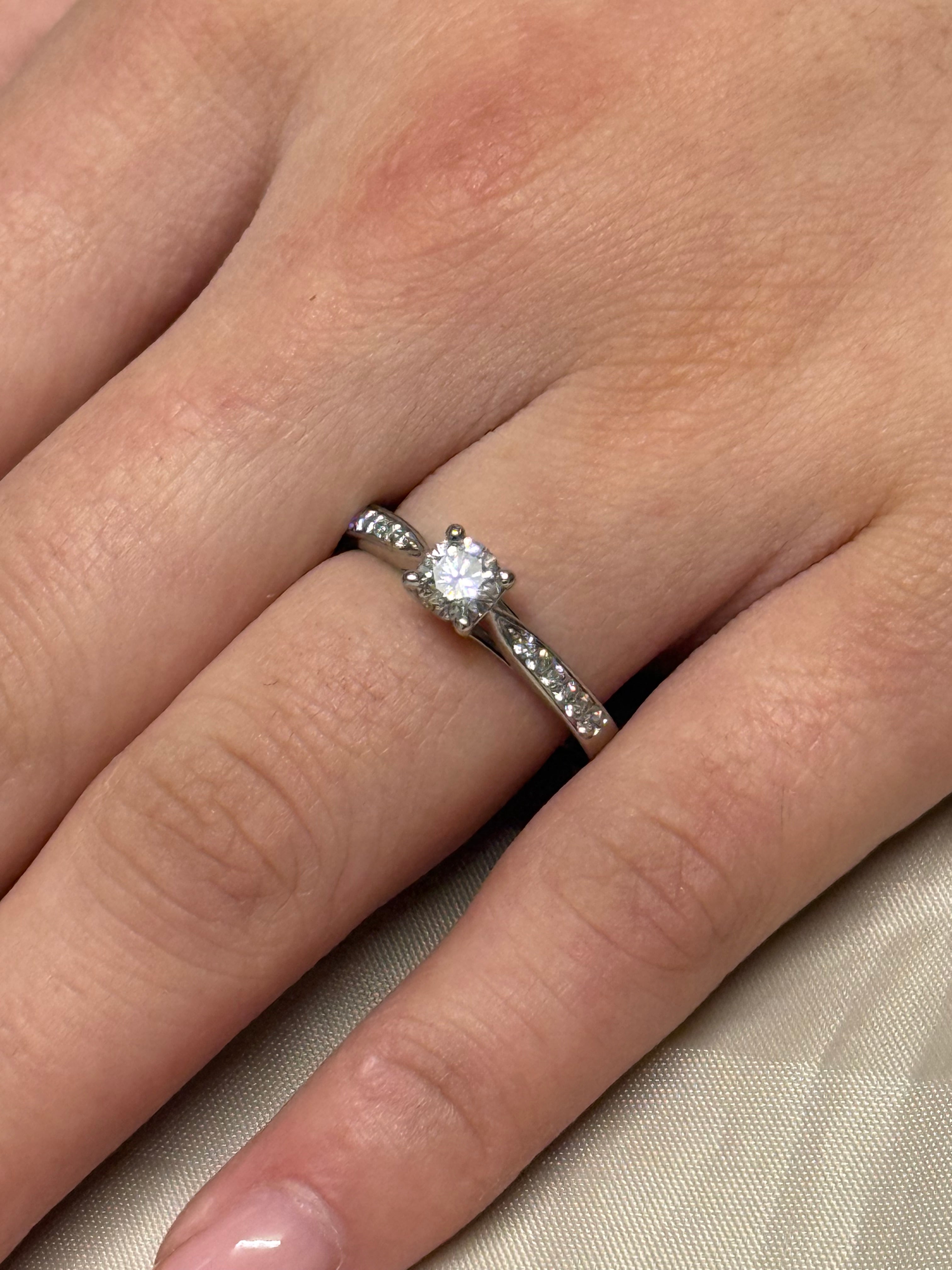 Platinum Brilliant Cut Diamond Solitaire With Diamond Band