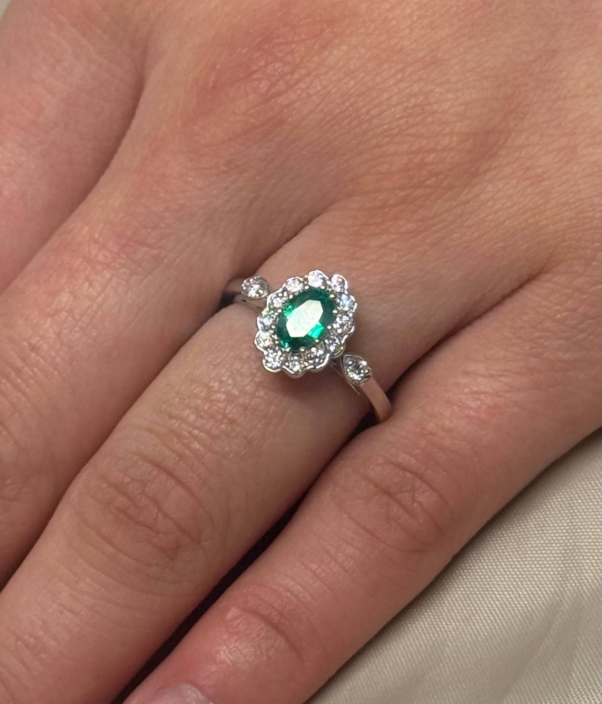 18K White Gold Emerald and Diamond Cluster with Diamond Side Stones