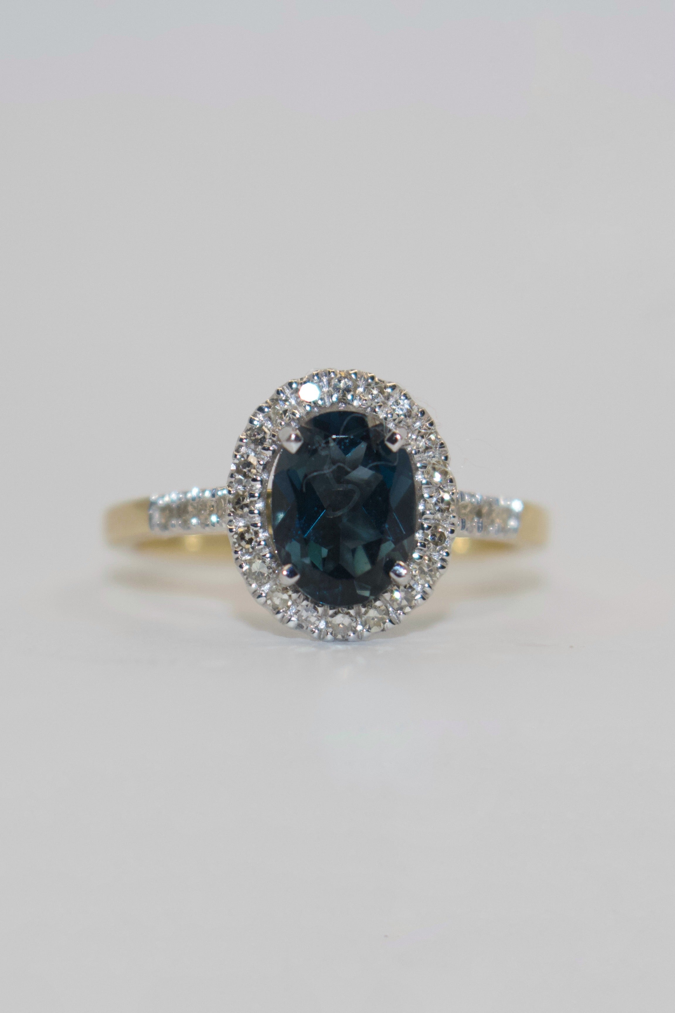 9K Yellow Gold Oval London Blue Topaz with Diamond Halo