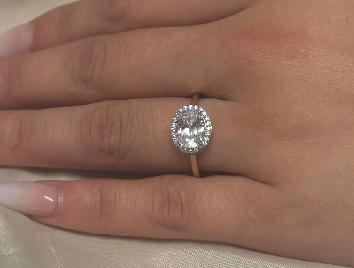 9K Yellow Gold Cz East West Oval Ring with Halo