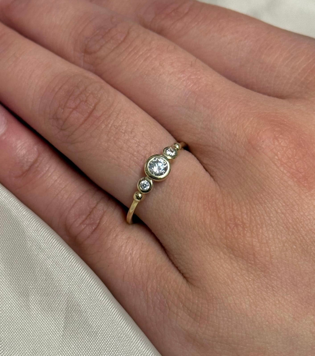 9K Yellow Gold Bezel Set CZ  Round Three Stone Ring