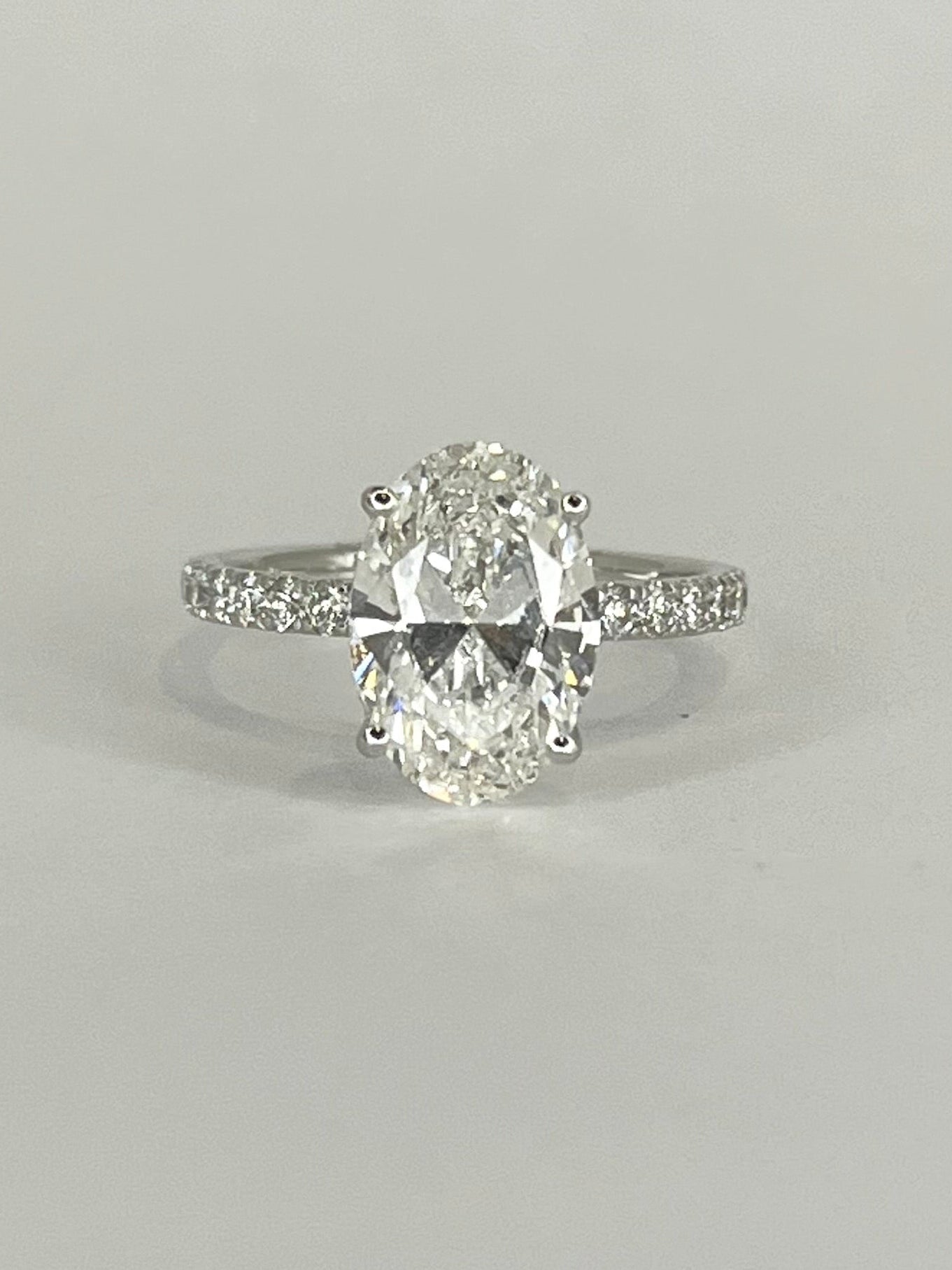 9K White Gold 3.40ct Oval Laboratory Grown Solitaire with Hidden Halo and Diamond Band