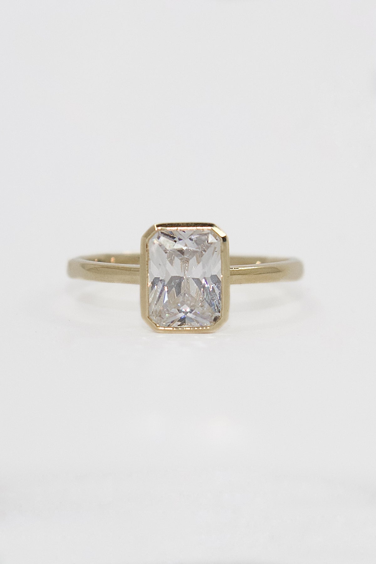 9K Yellow Gold Bezel Set Radiant Cz Ring