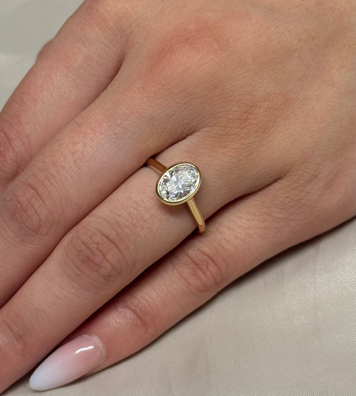9K Yellow Gold 1.42ct Laboratory Grown Bezel Set Oval Ring