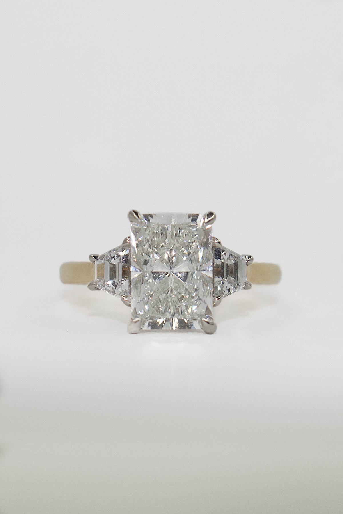 18K Yellow Gold 3.69ct Laboratory Grown Radiant and Trapezoid Centurion Three Stone Ring