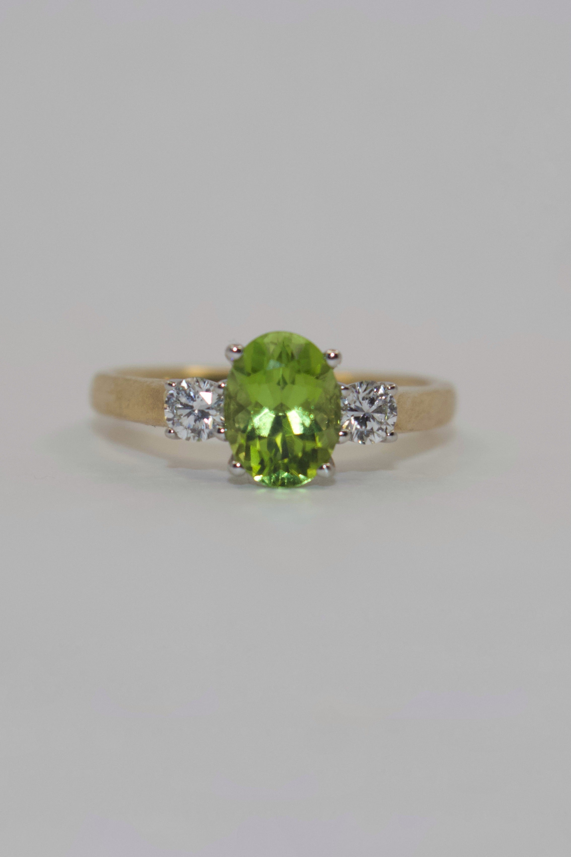 9K Yellow Gold Peridot and Diamond Three Stone Ring