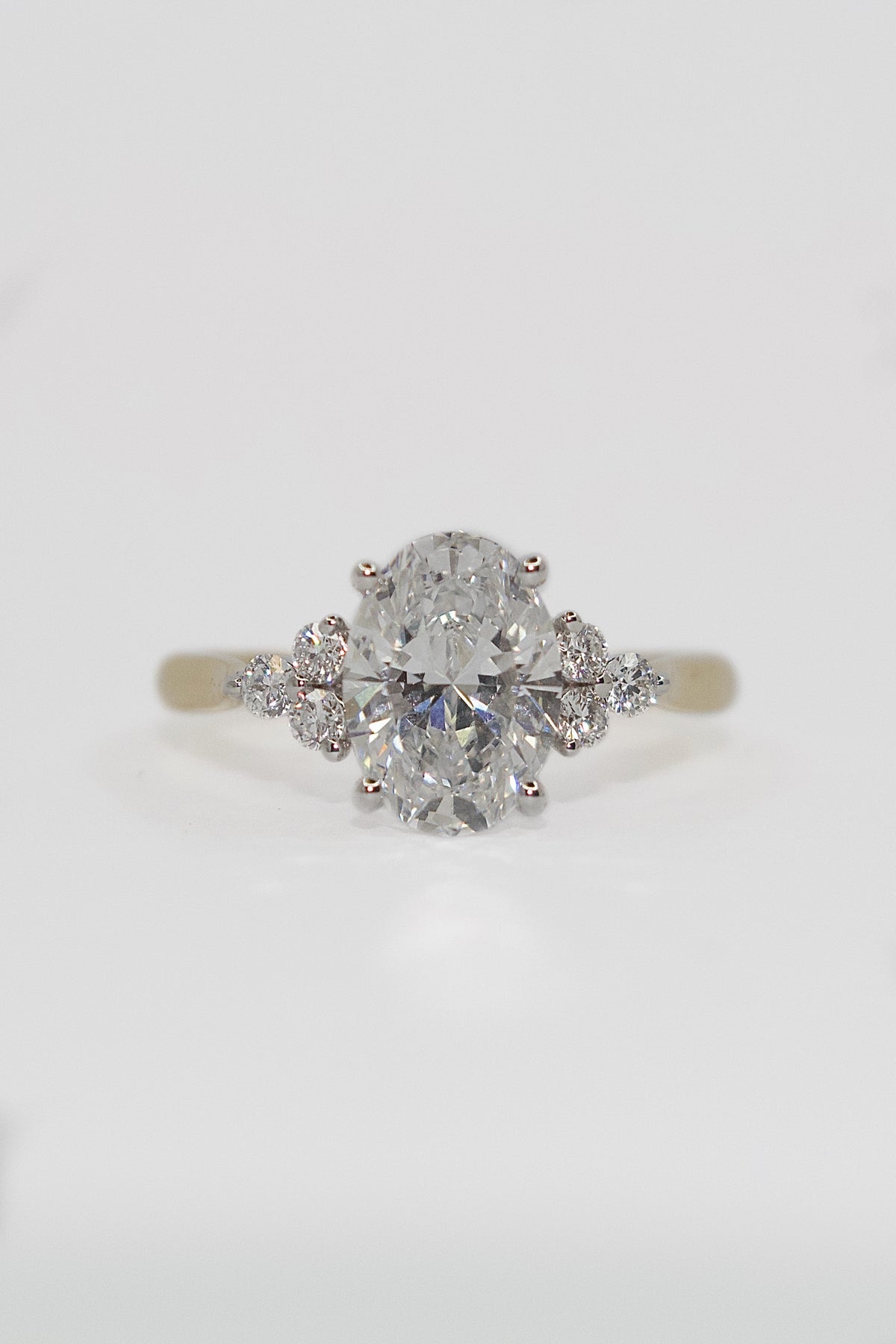 18K Yellow Gold 2.20ct Laboratory Grown Oval Ring with Brilliant Cut Side Stones