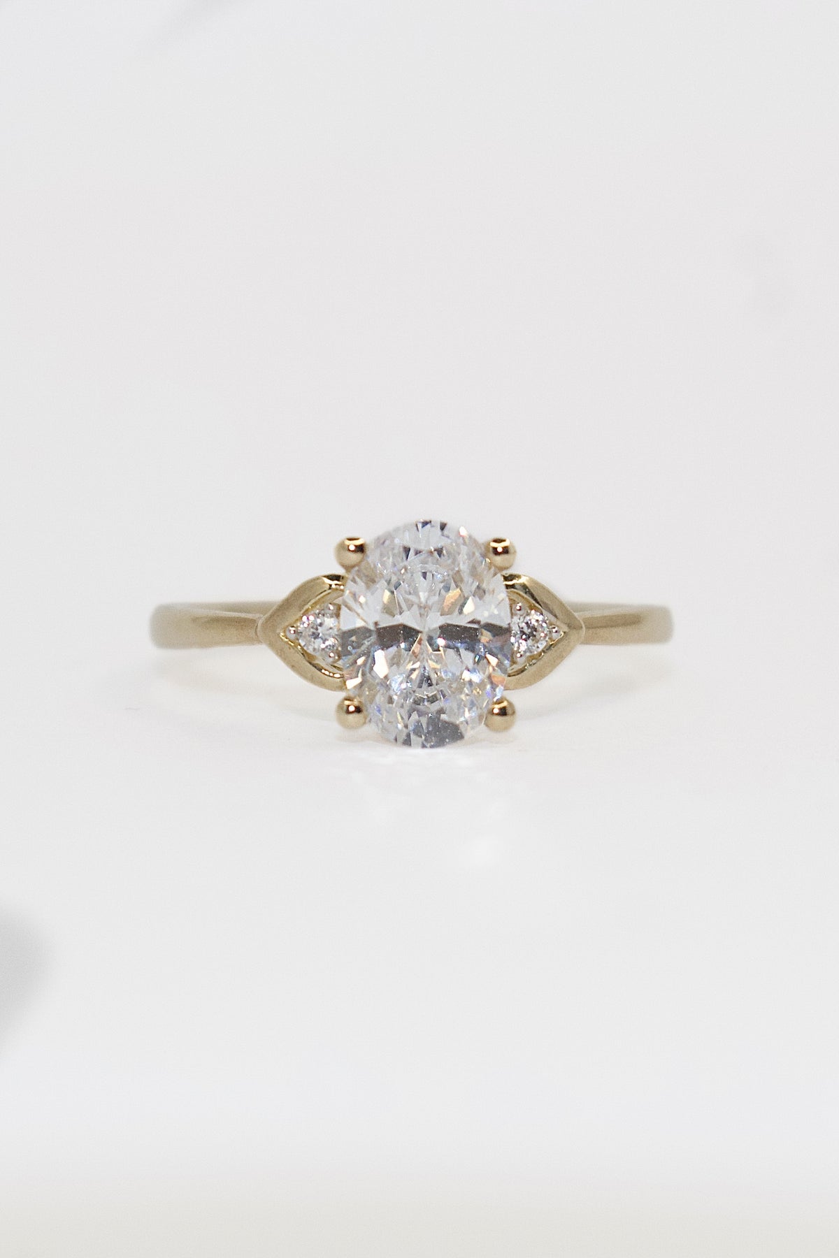 9K Yellow Gold Cz Oval Three Stone with Split Setting