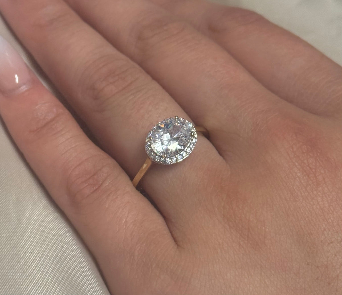 9K Yellow Gold Cz East West Oval Ring with Halo