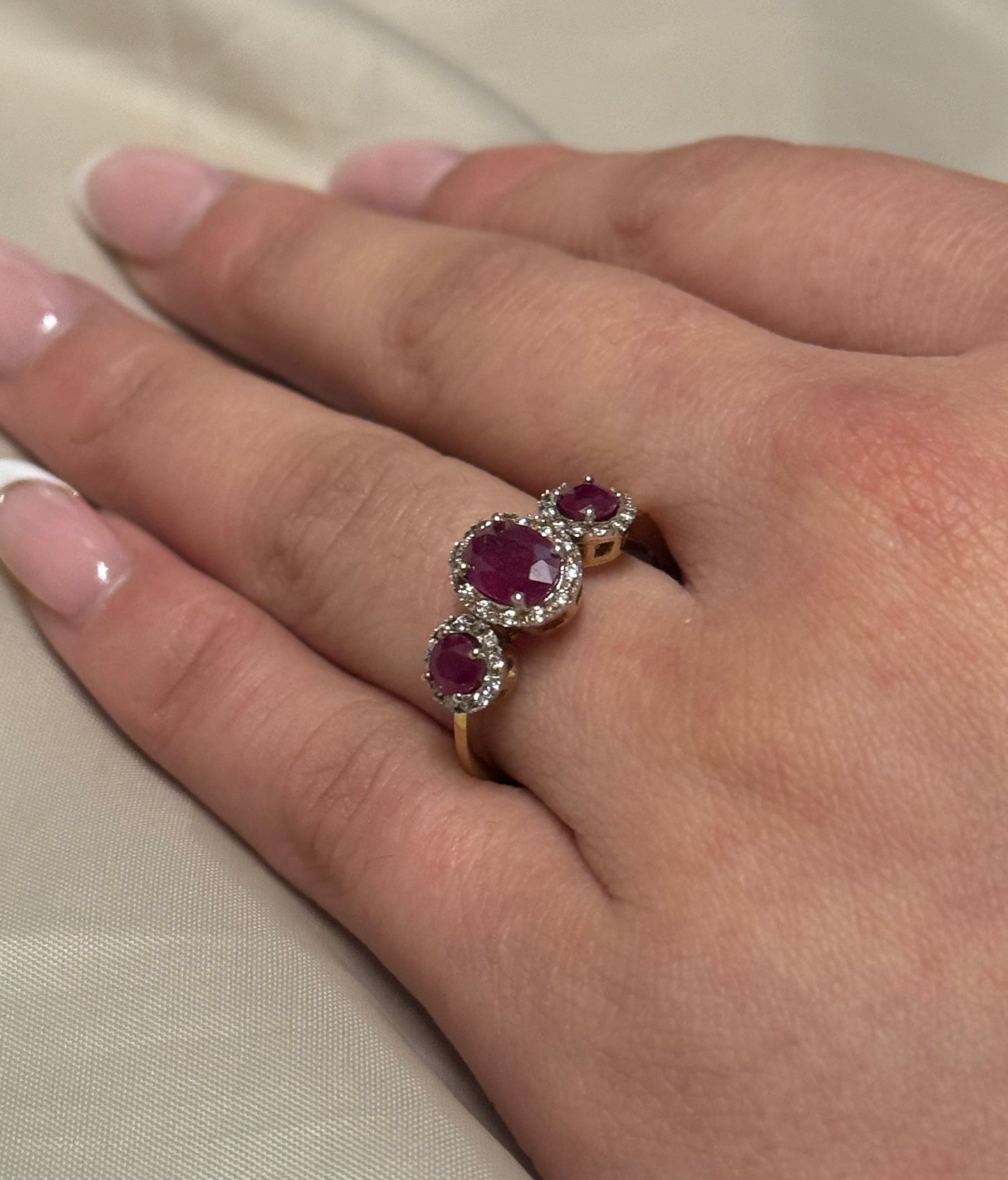 9K Yellow Gold Oval Ruby Three Stone with Diamond Halo