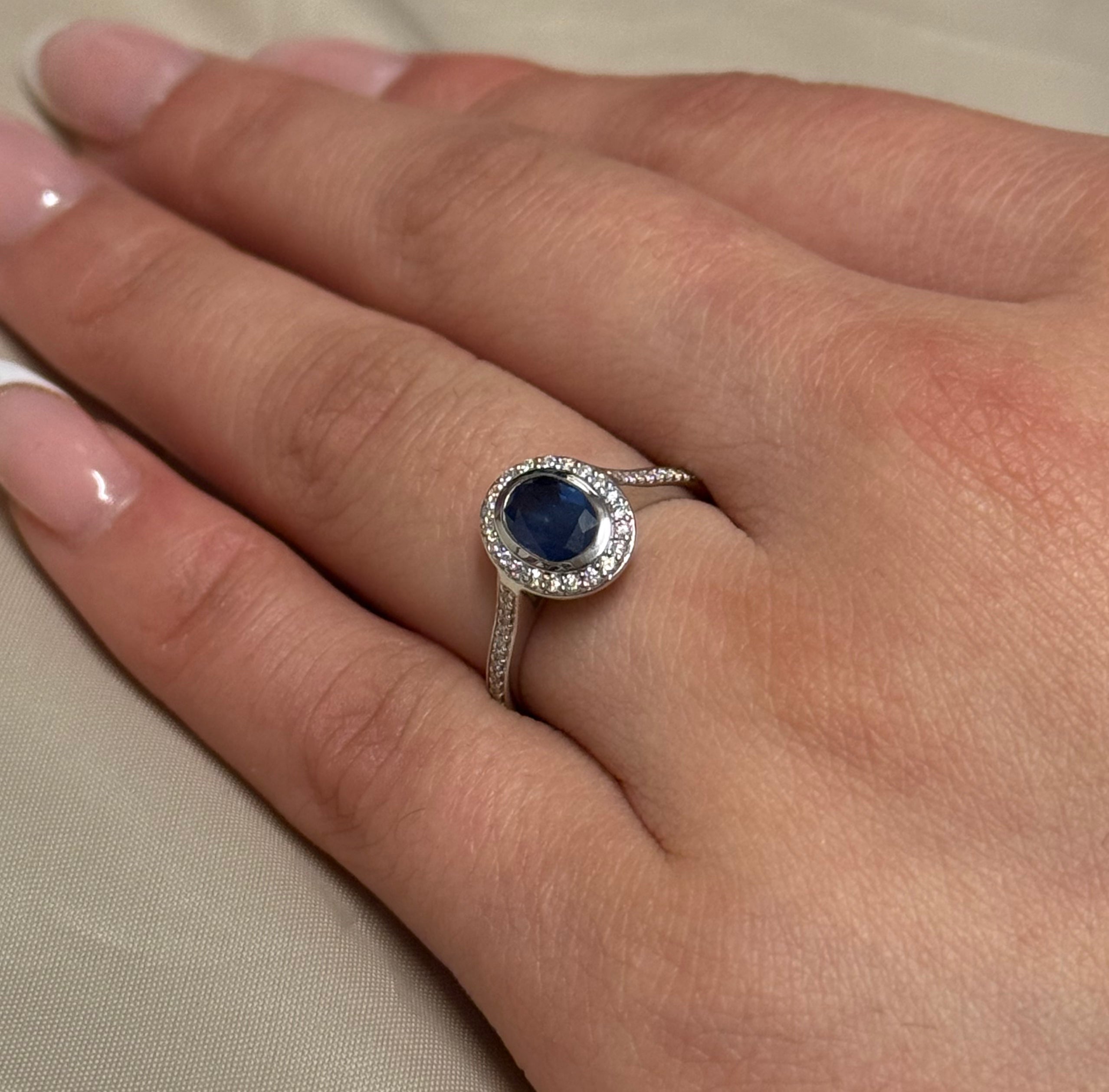 9ct White Gold Oval Sapphire and Diamond Halo Ring