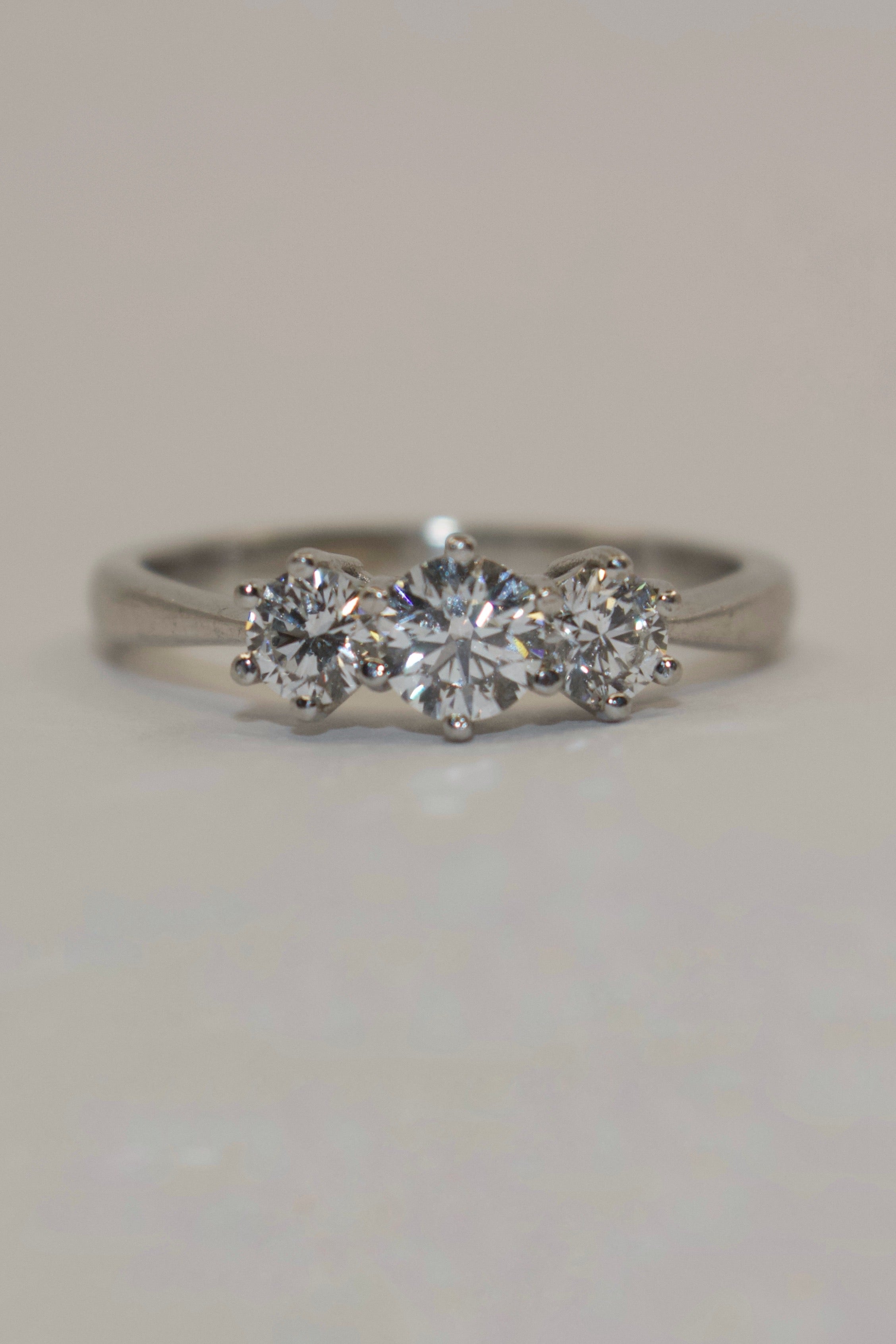 18K White Gold Brilliant Cut Three Stone Diamond Ring